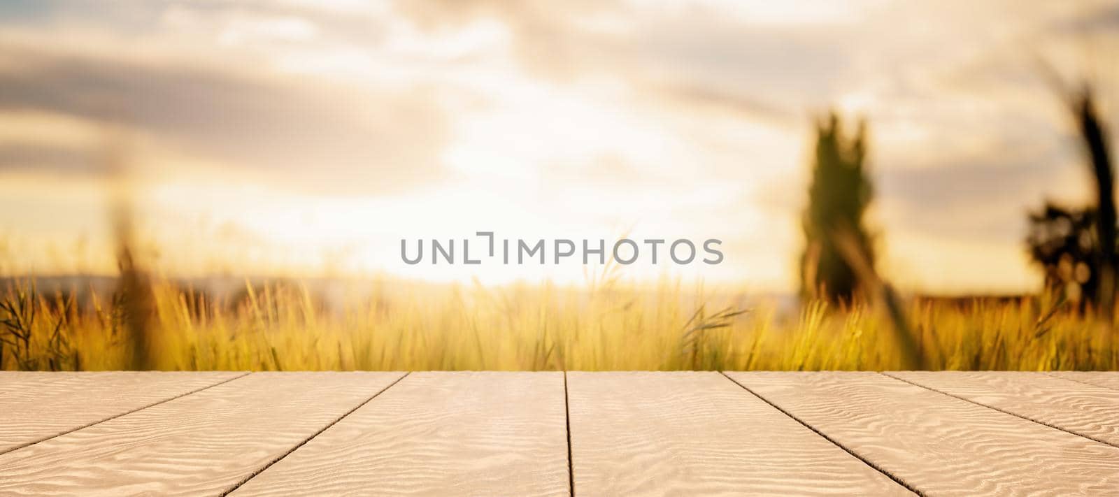 wooden table with blurred background of field of wheat and sunset for product display. 3d render