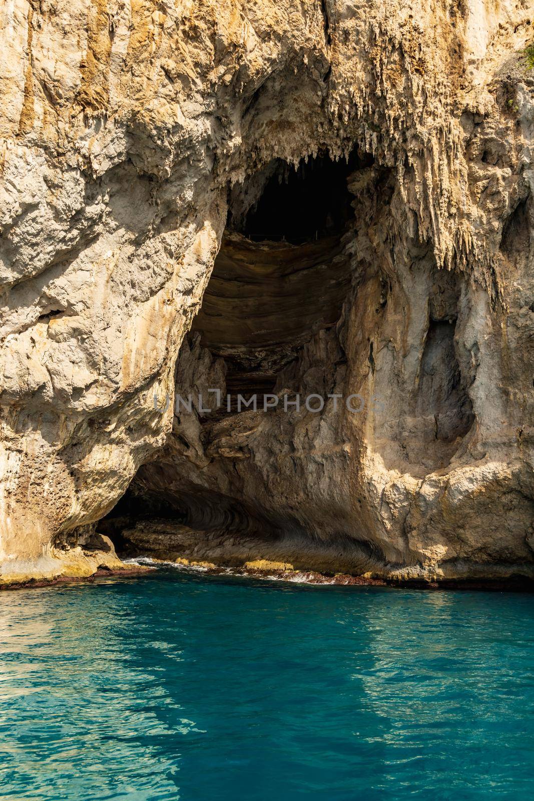 Entrance to Grotta Bianca next to azure waters next to Capri island by Wierzchu