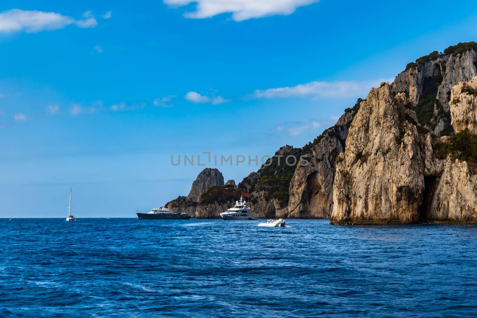 Edge of high cliff next to the sea at sunny day on Capri island