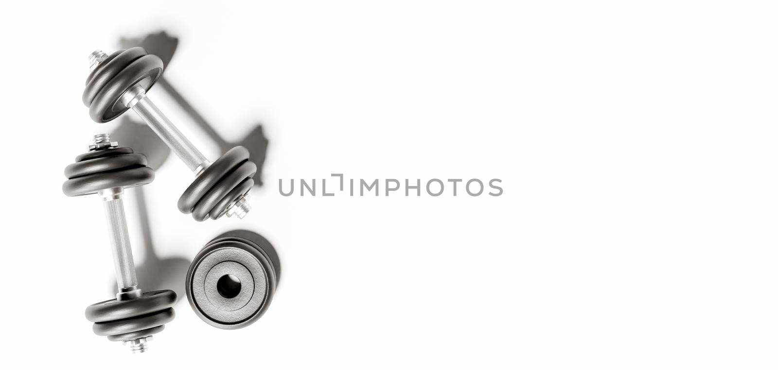 dumbbells with black discs on white background by asolano