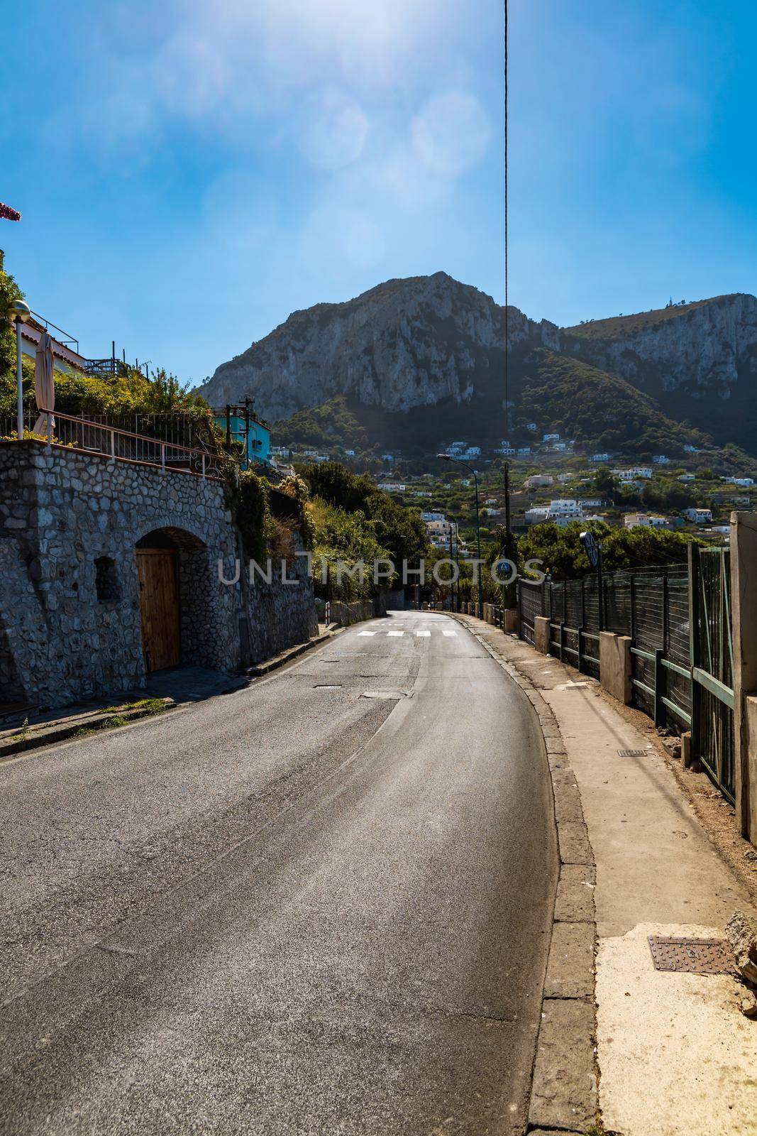 Street view to buildings and mountains on Capri island at sunny day