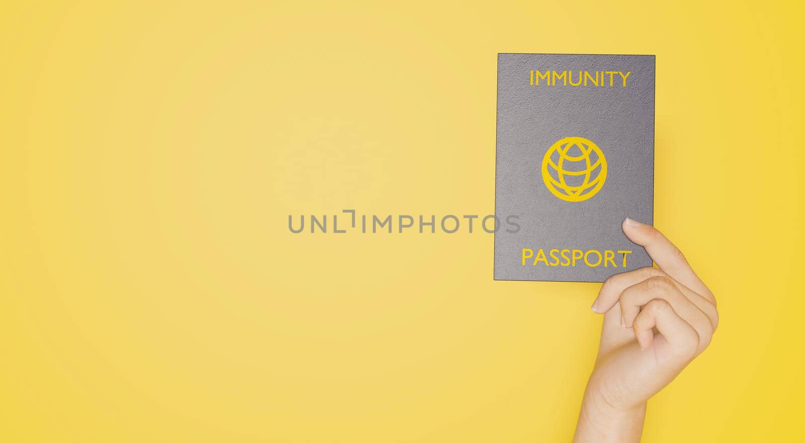 coronavirus immunity passport banner held by a hand on yellow background. 3d rendering