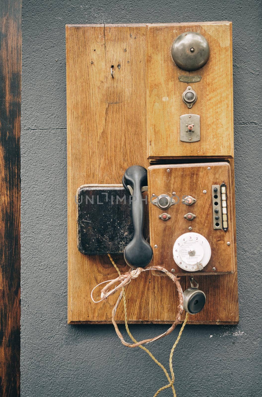 vintage old wood cabin telephone. by Sandronize