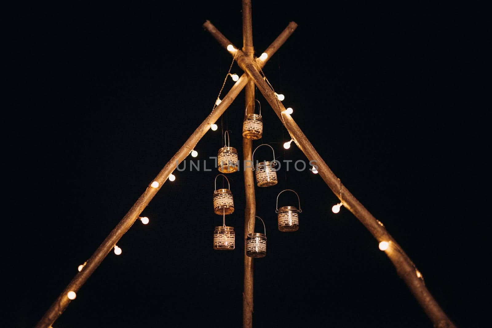 moroccan decor on the shores of a beautiful lake, candles and bungalows