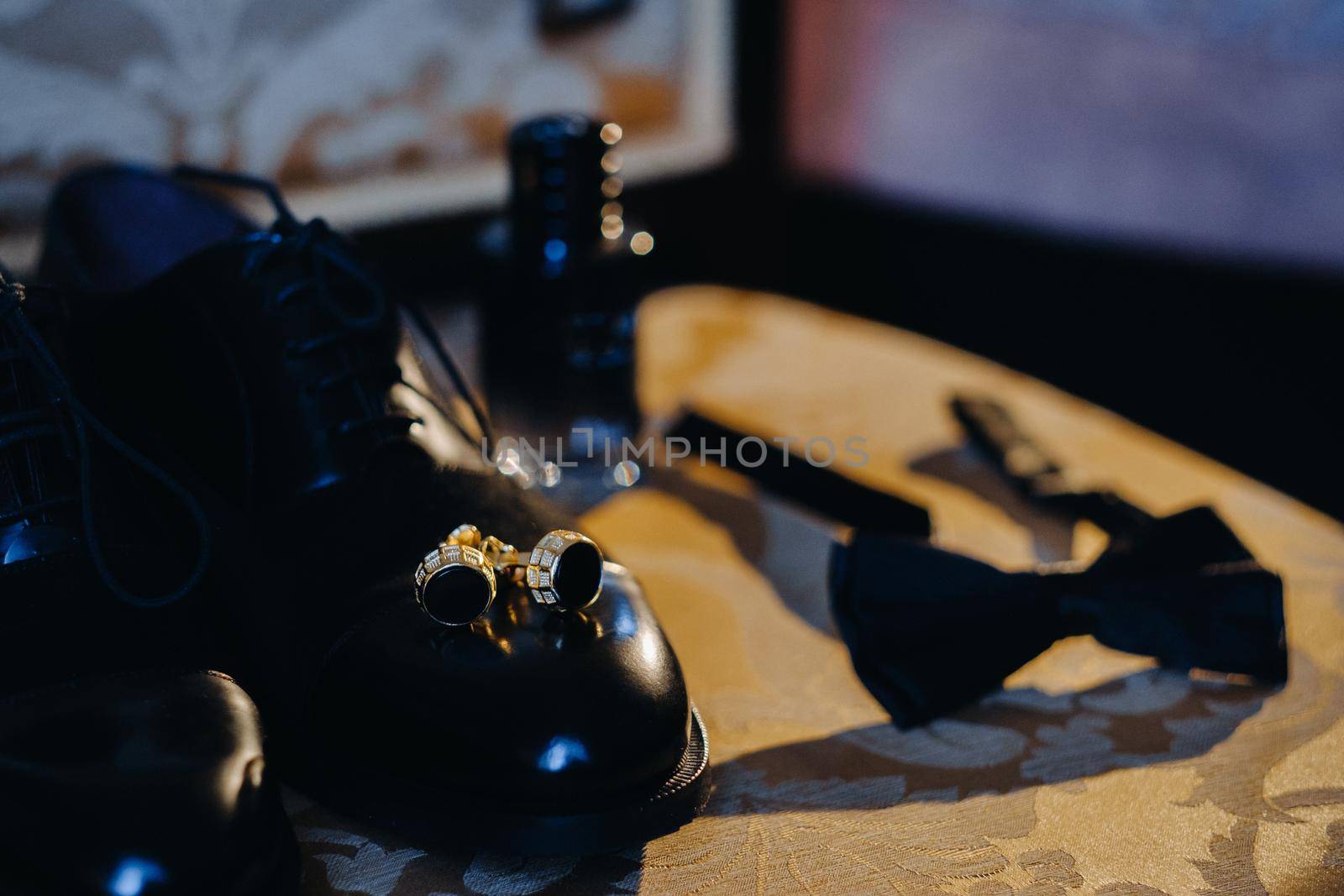 Gentleman's set of businessman and groom. Wedding details of the groom on the chair.