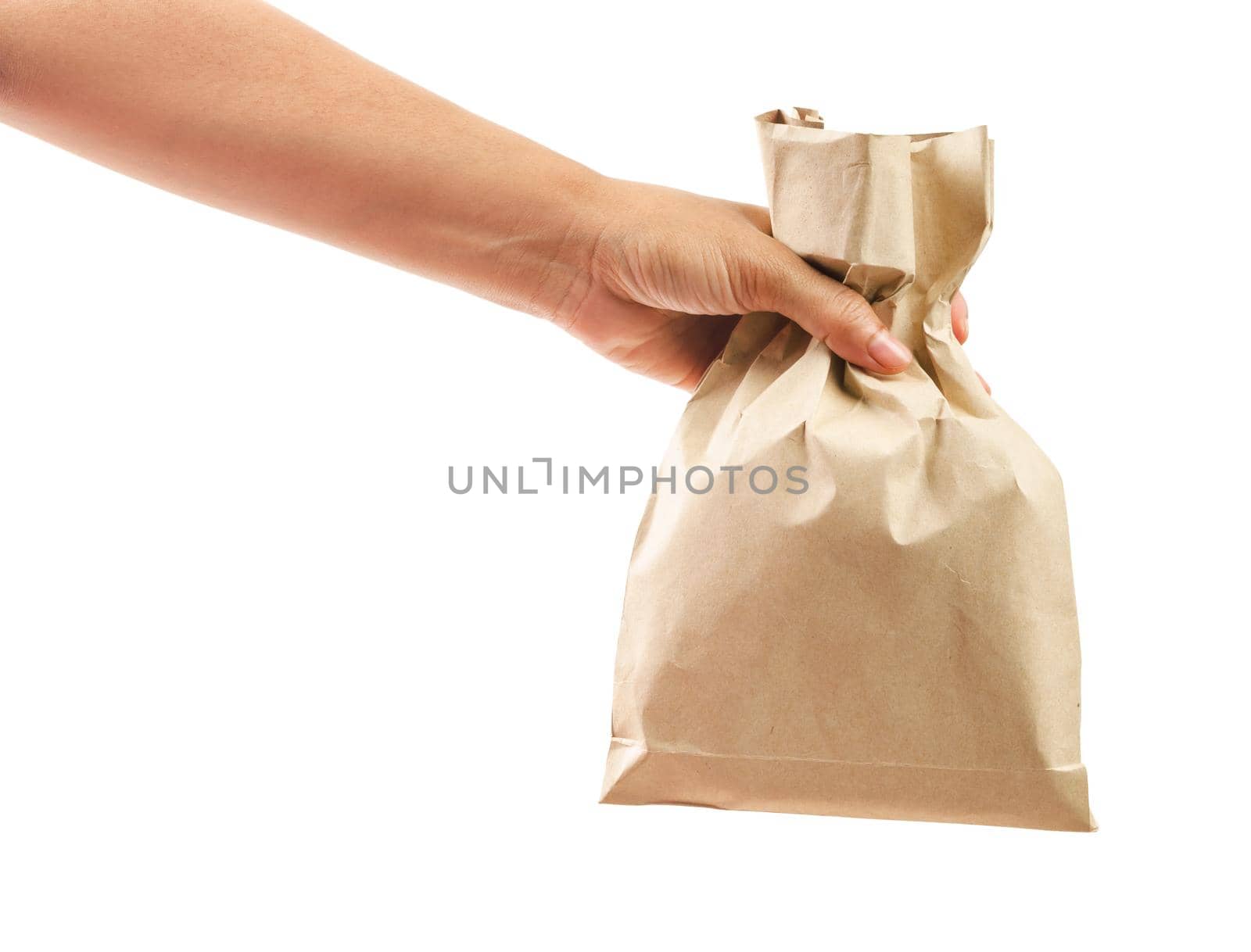 Hand holding paper bag isolated on white background, Save clipping path.