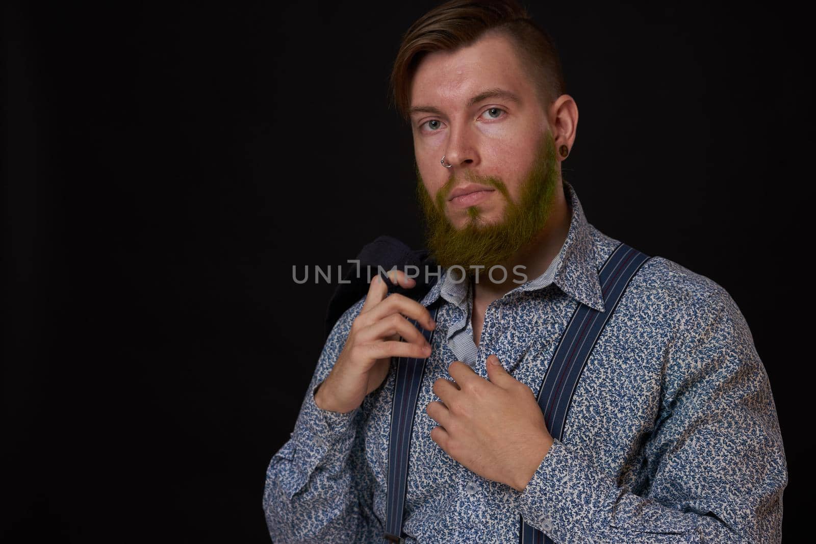 bearded man elegant style shirt dark background. High quality photo