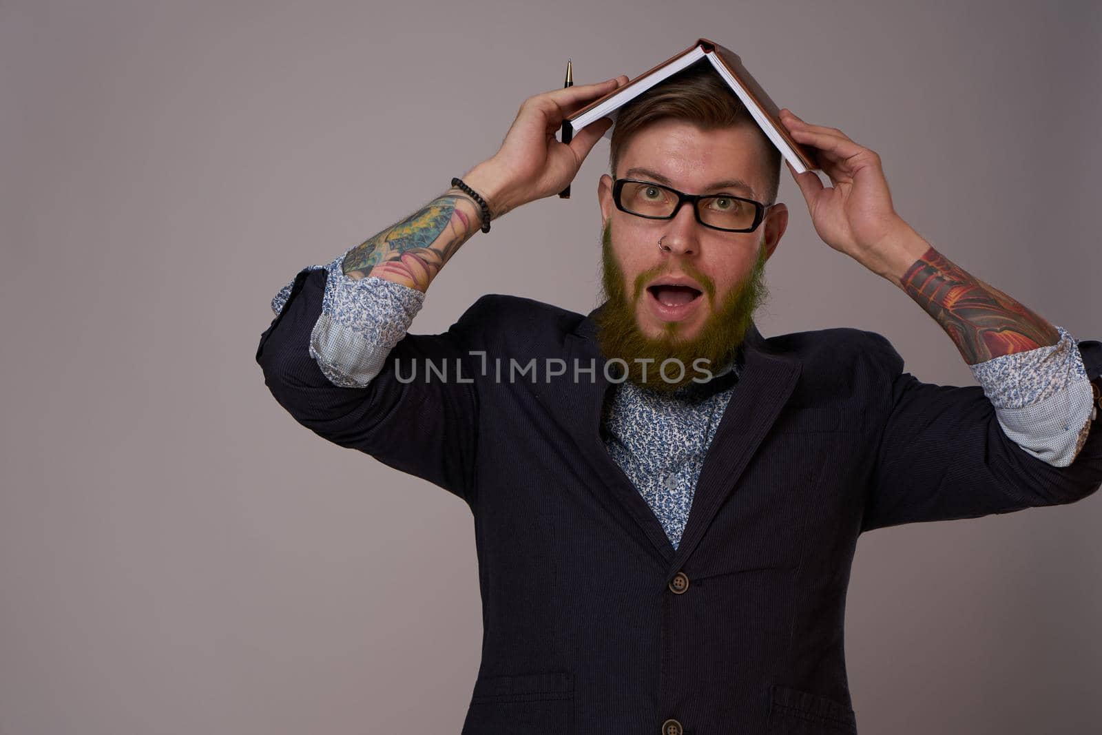 business man with a book in his hands job manager professionals. High quality photo