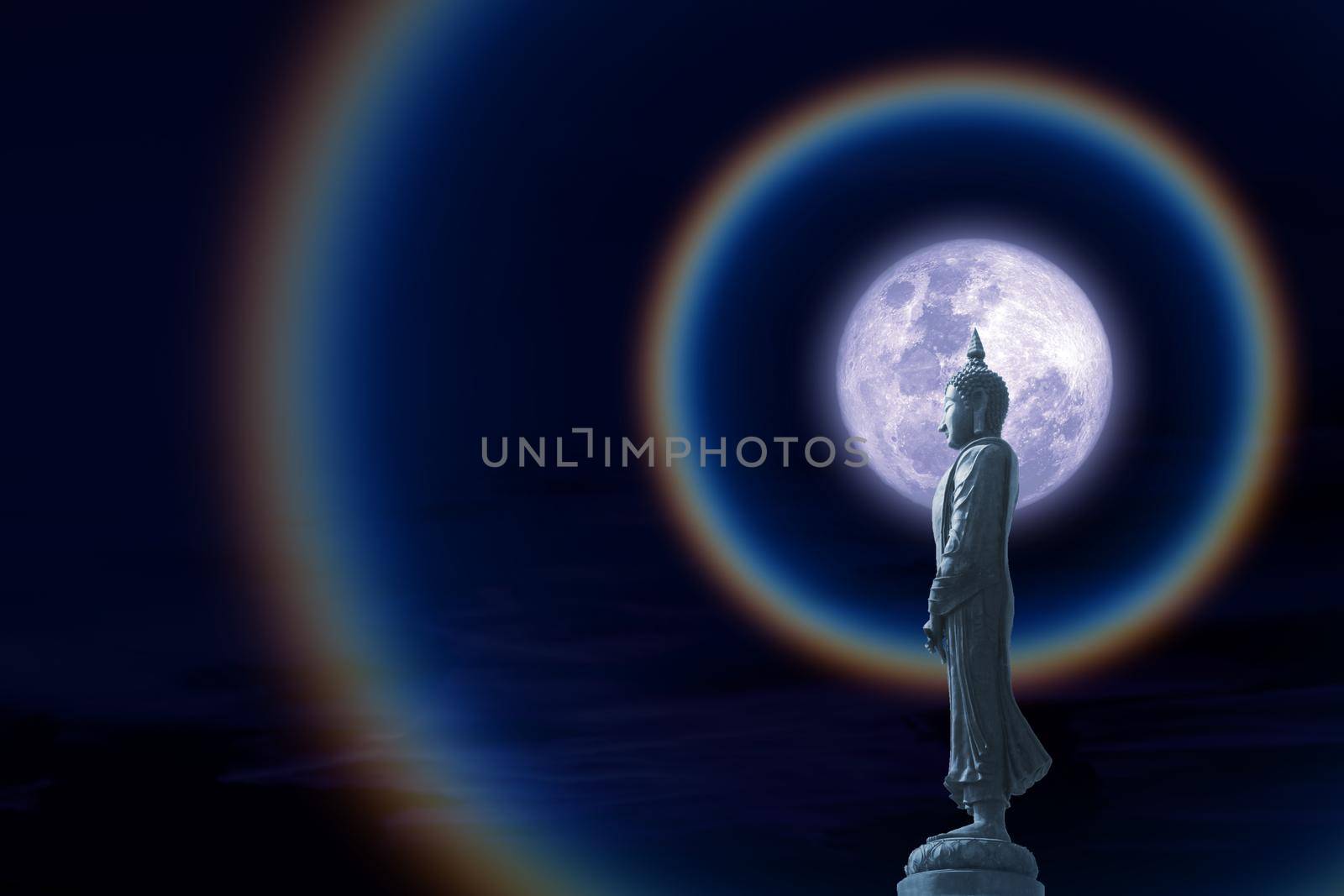 Moon corona light and Buddha looking seven day style on the night sky, Makha Bucha Day is held full moon day on february or march, Elements of this image furnished by NASA