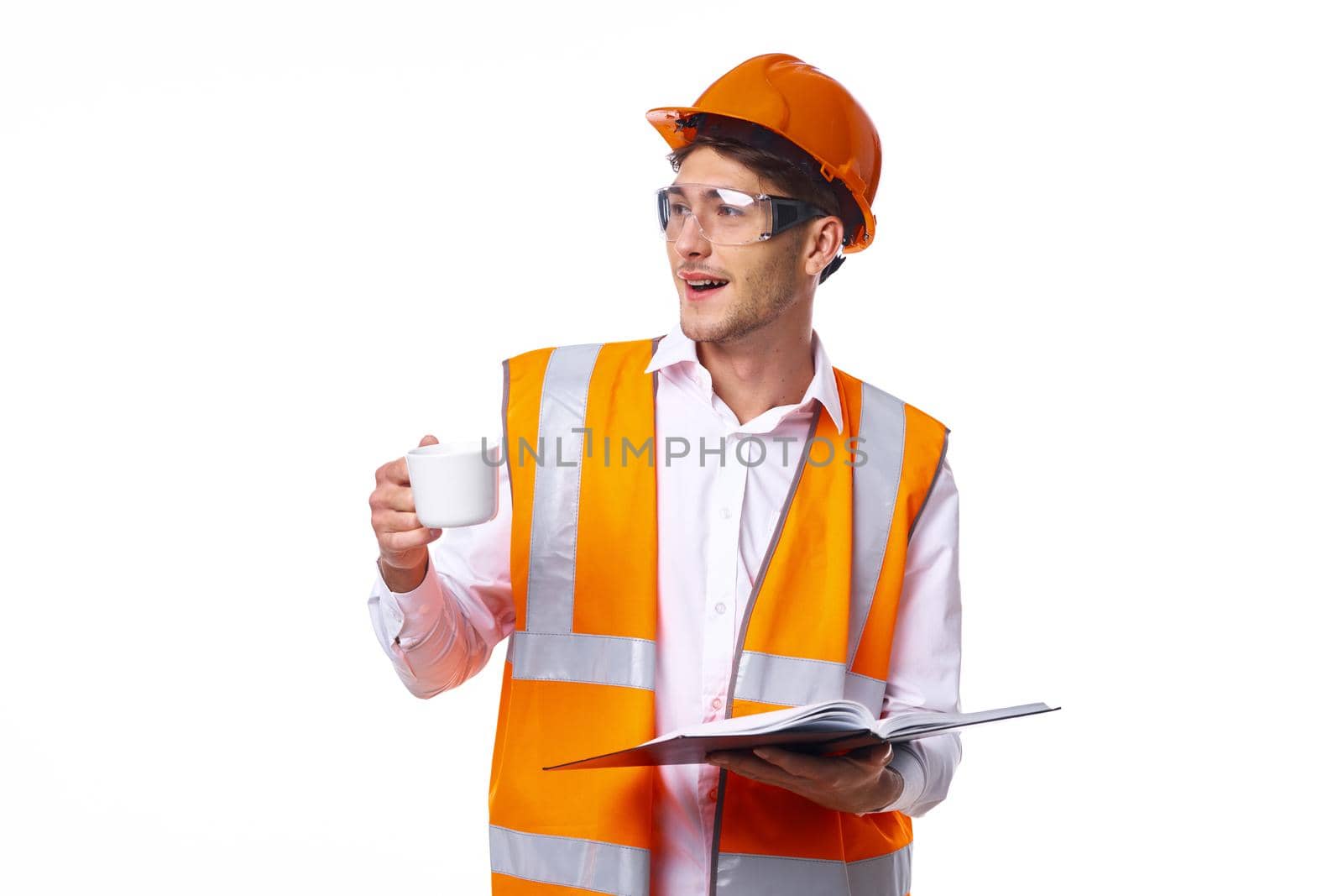 man in work uniform orange helmet safety professional work. High quality photo