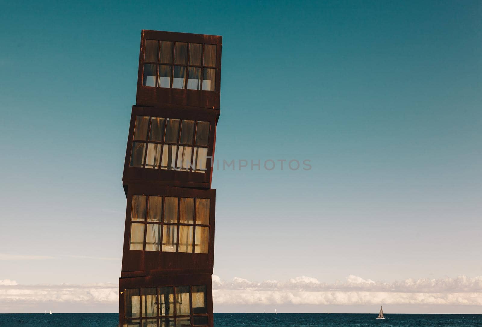 Barcelona, Spain. The sculpture designed by installation artist Rebecca Horn in COR-TEN steel presides over this urban beach