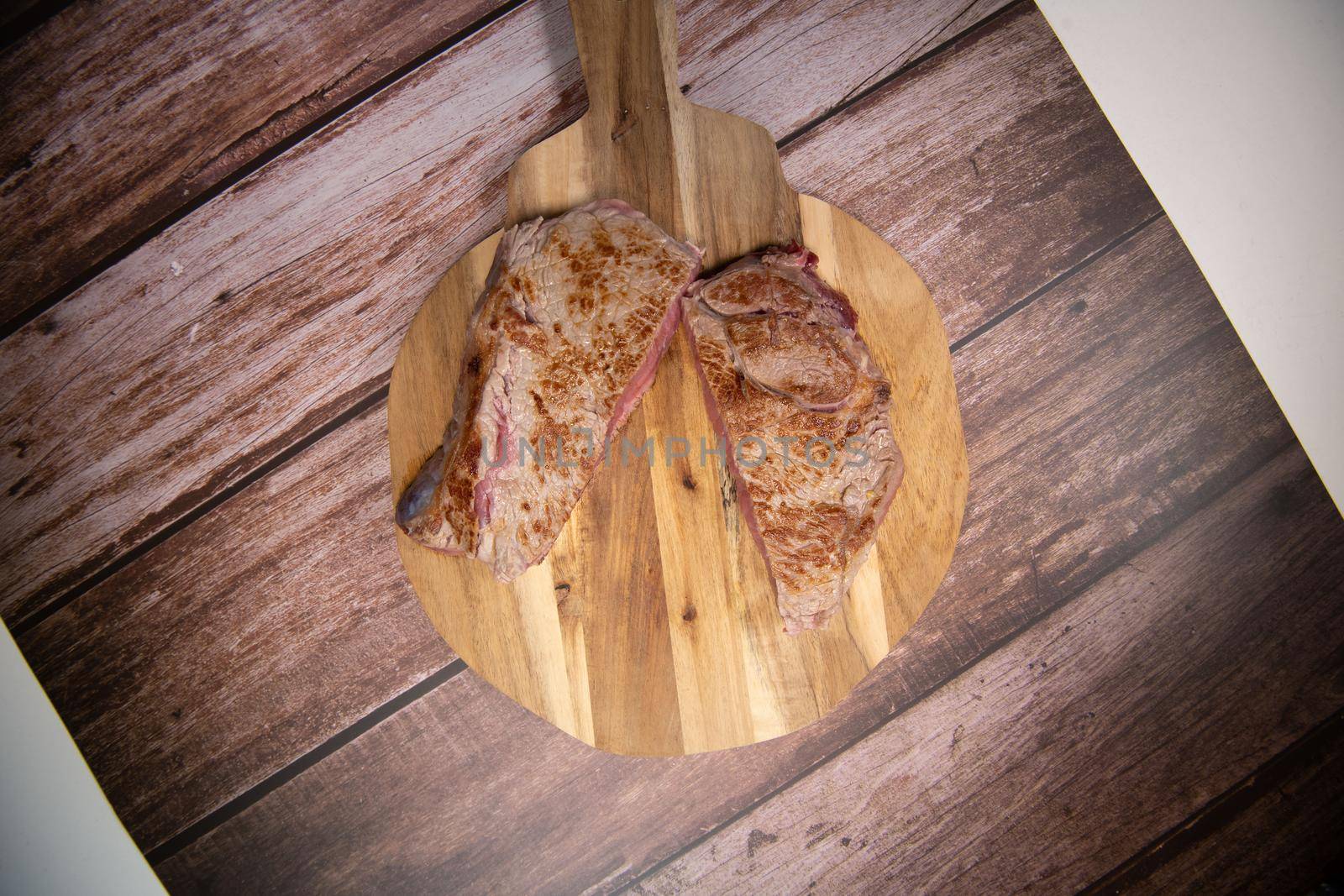 Recipe for gratin dauphinois, grilled veal steak and grilled button mushroom. High quality photo