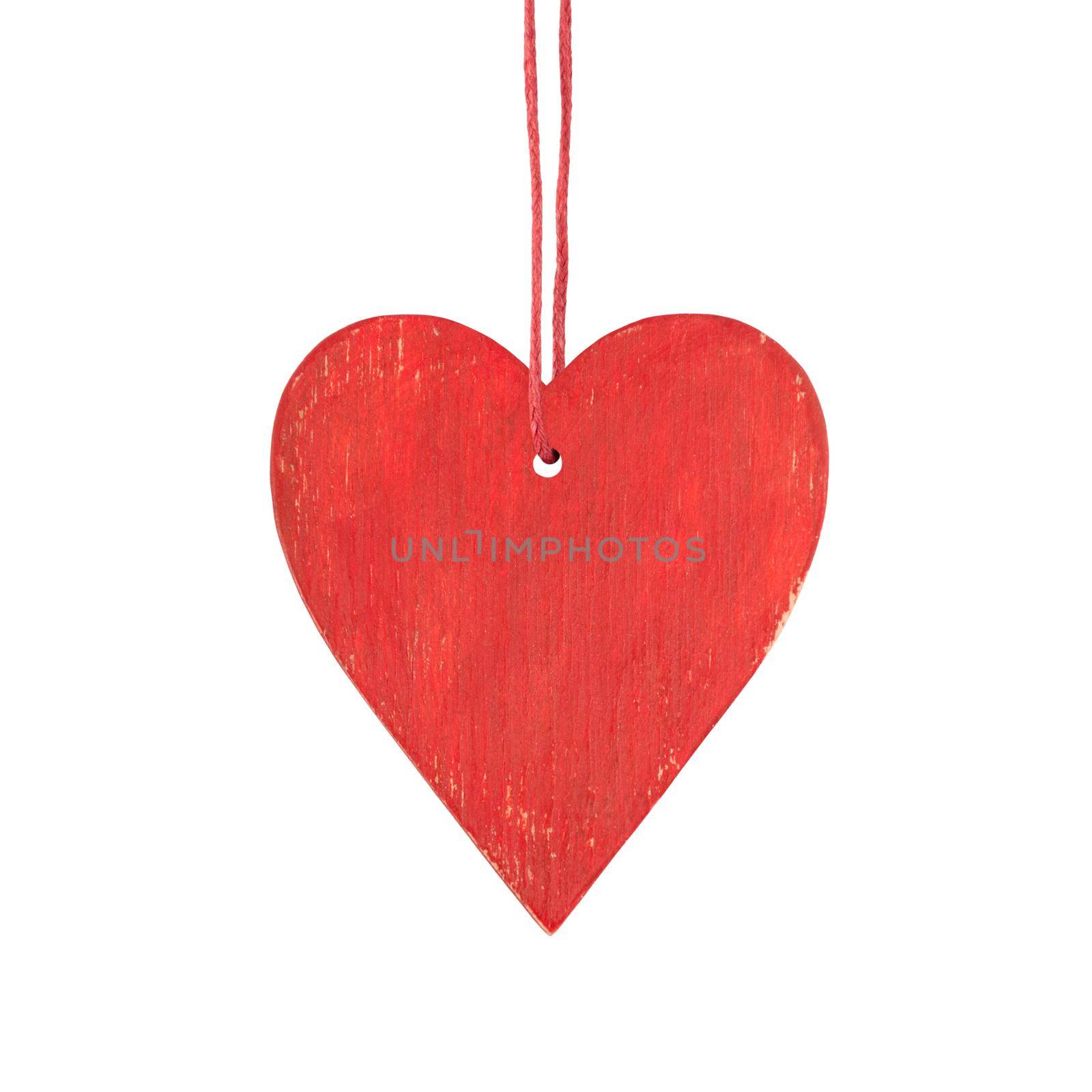 Hanging red wooden heart. Christmas ornament isolated on white background.