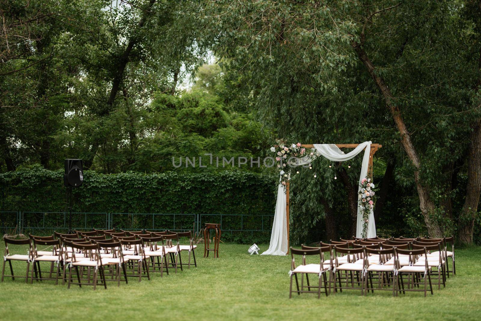 wedding ceremony area with dried flowers in a meadow in a pine brown forest