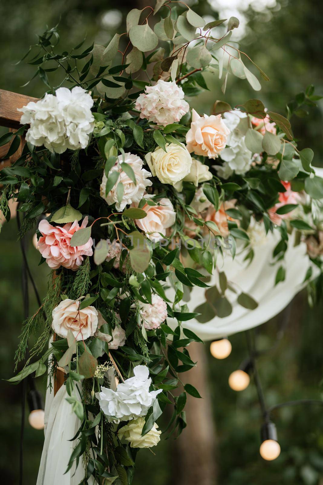 wedding ceremony area with dried flowers in a meadow in a pine brown forest