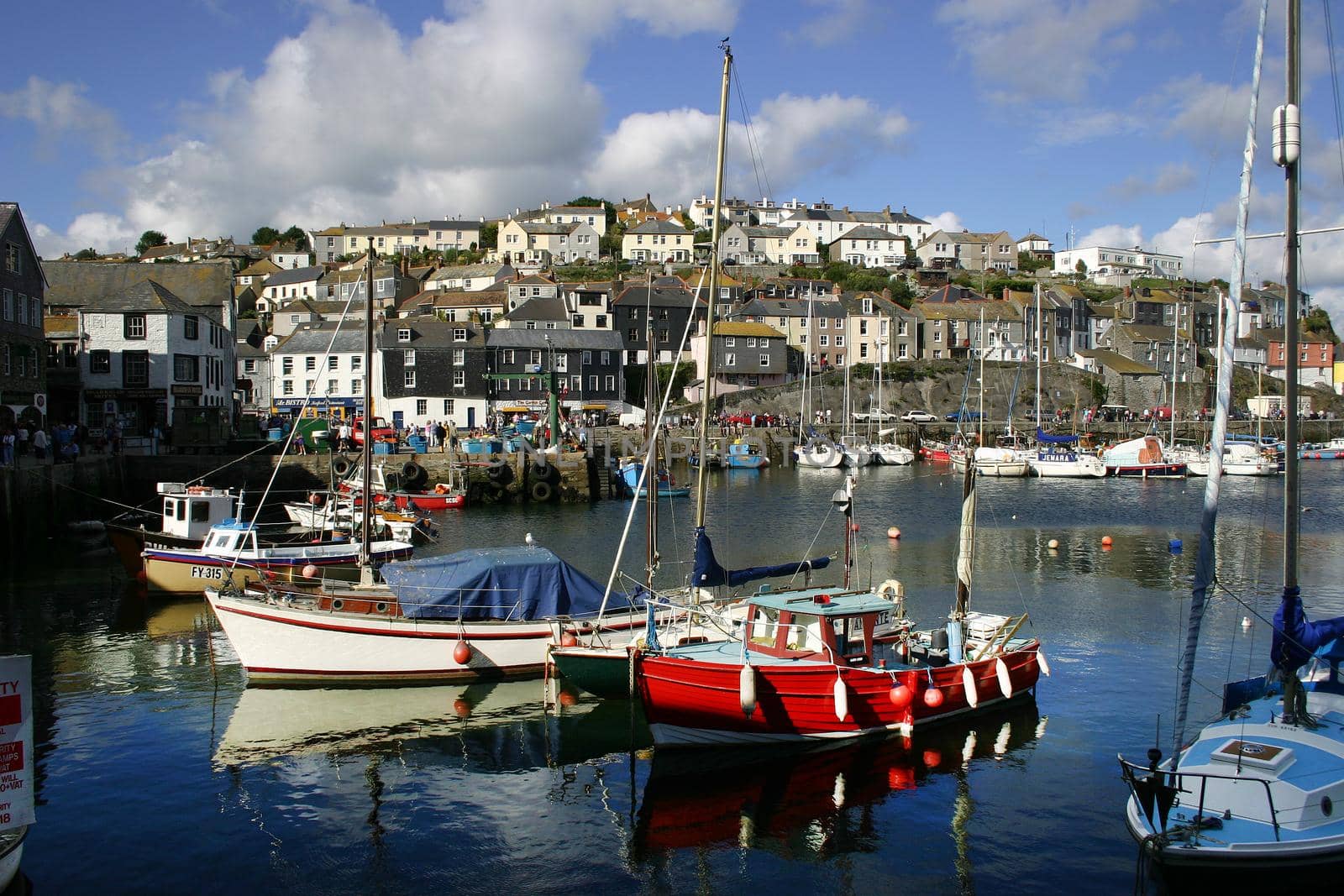 Some fishing boats in Mevagissey harbour Cornwall England