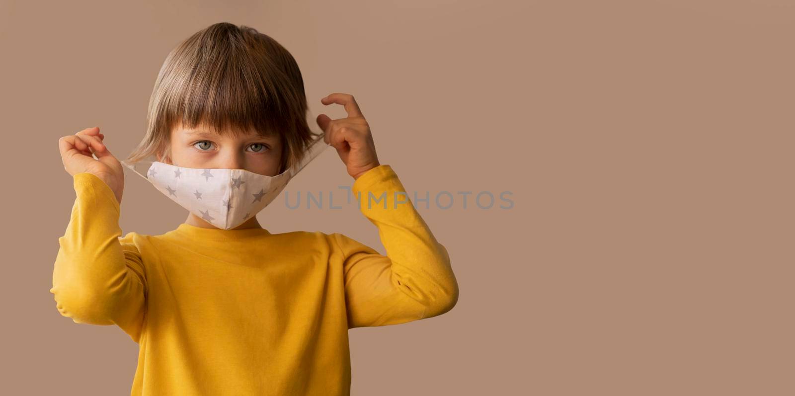 boy wearing medical mask with copy space. High resolution photo
