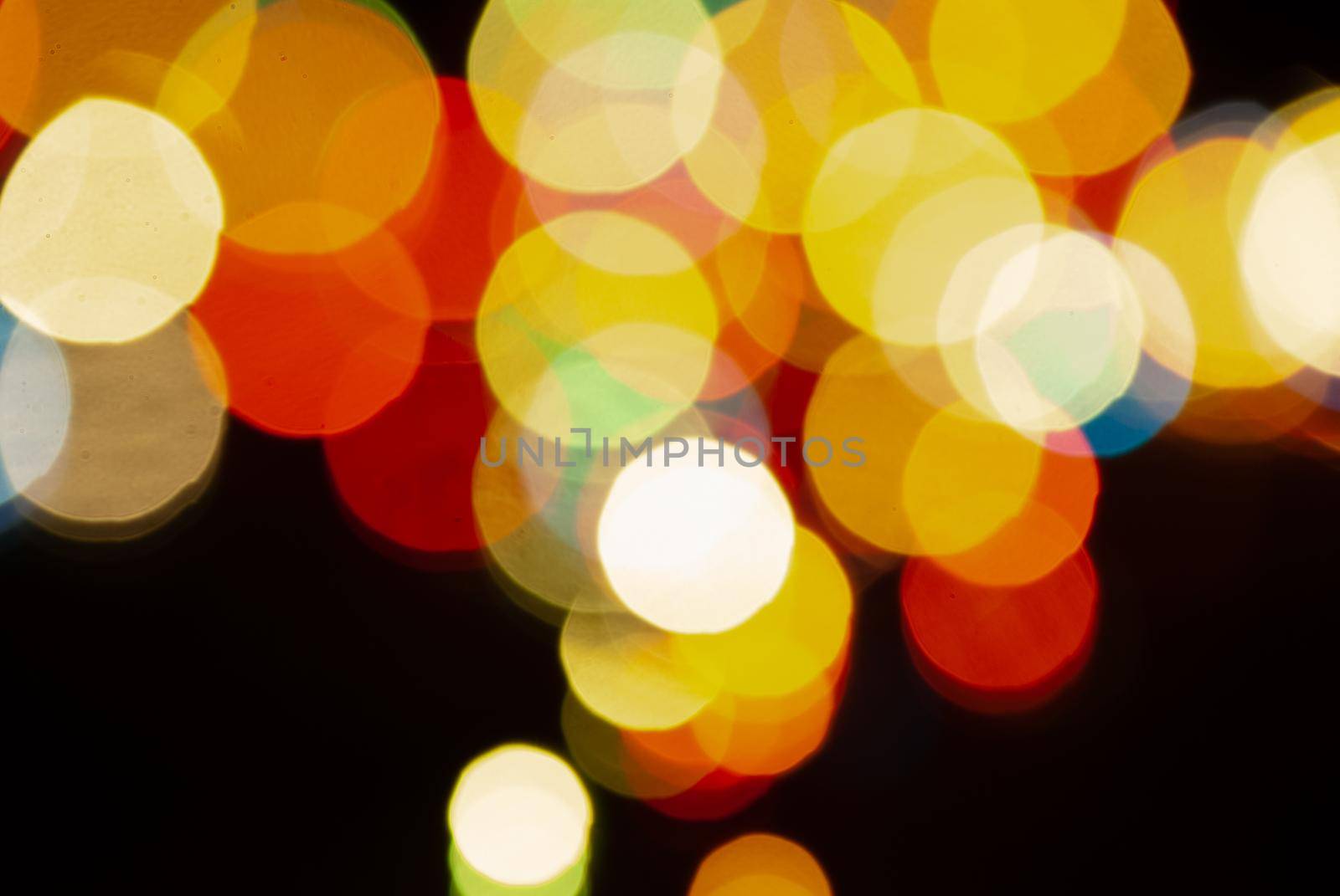 colored blurred bokeh christmas garlands by Andreua