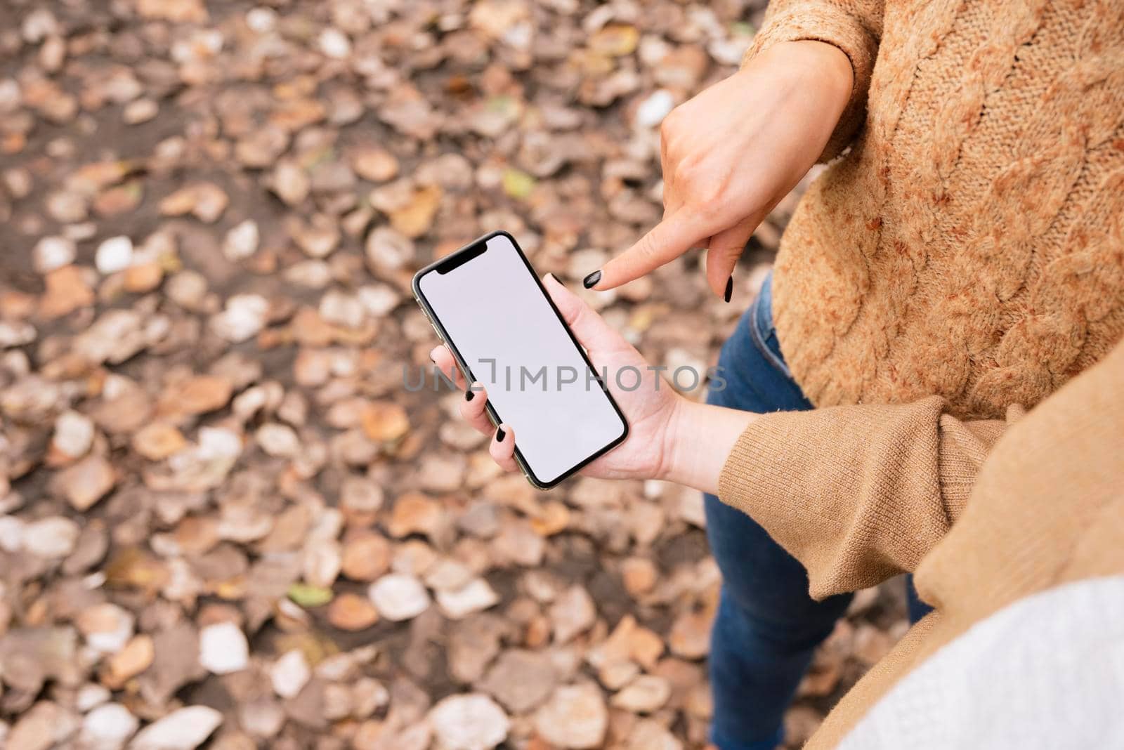 close up two young women looking phone. High quality photo by Zahard