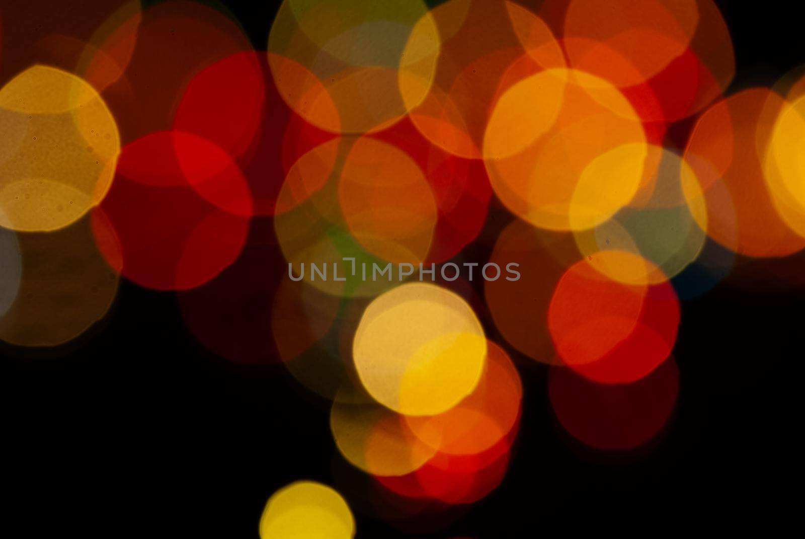 colored blurred bokeh christmas garlands by Andreua