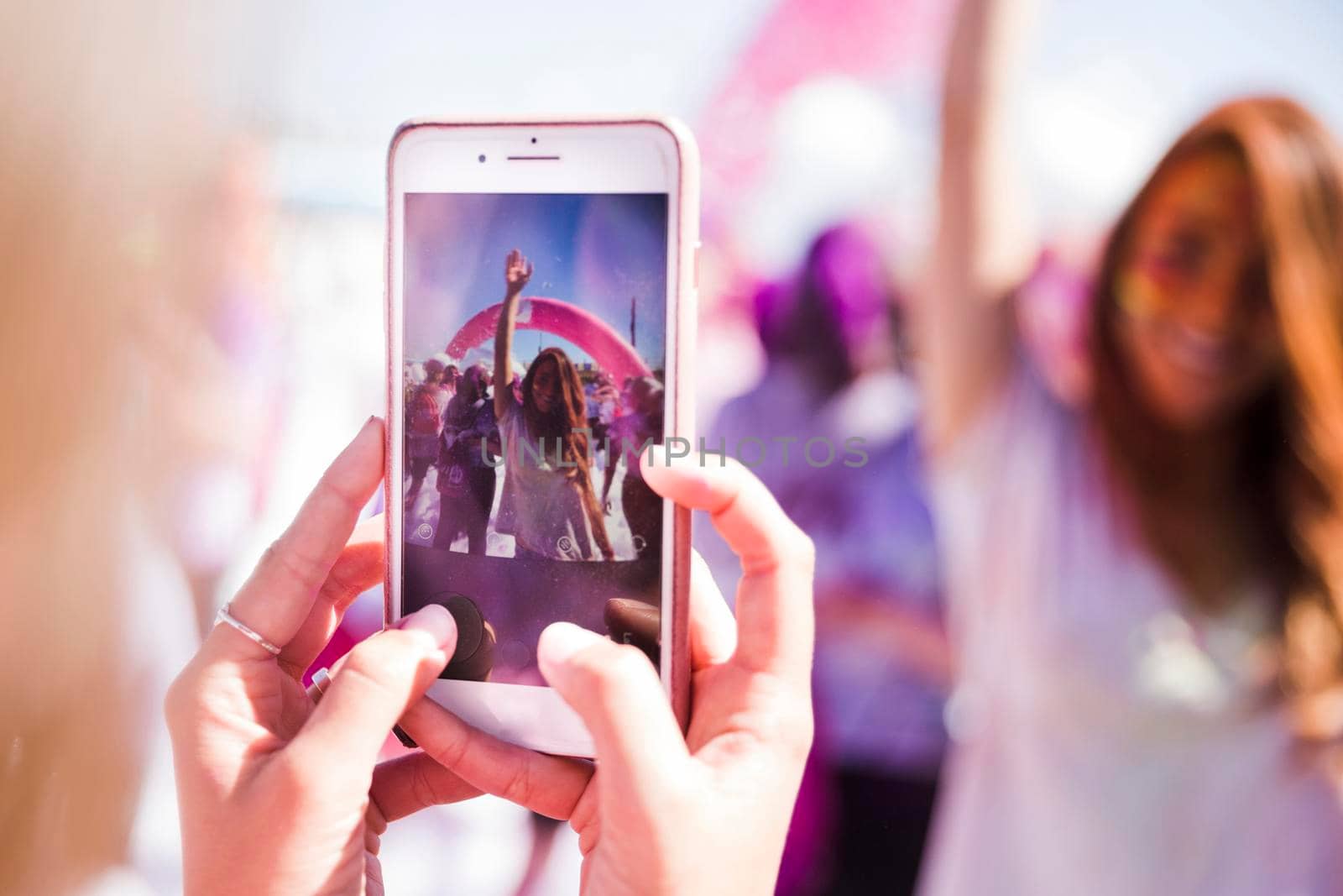 close up woman taking her friend mobile phone. High quality photo by Zahard