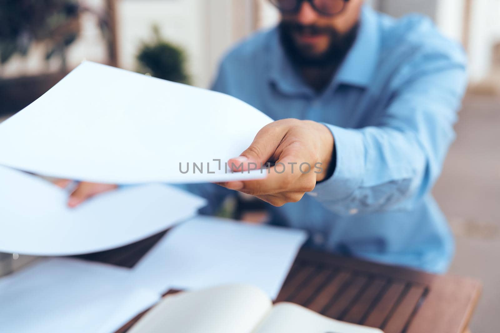 bearded man work documents technology manager in cafe. High quality photo