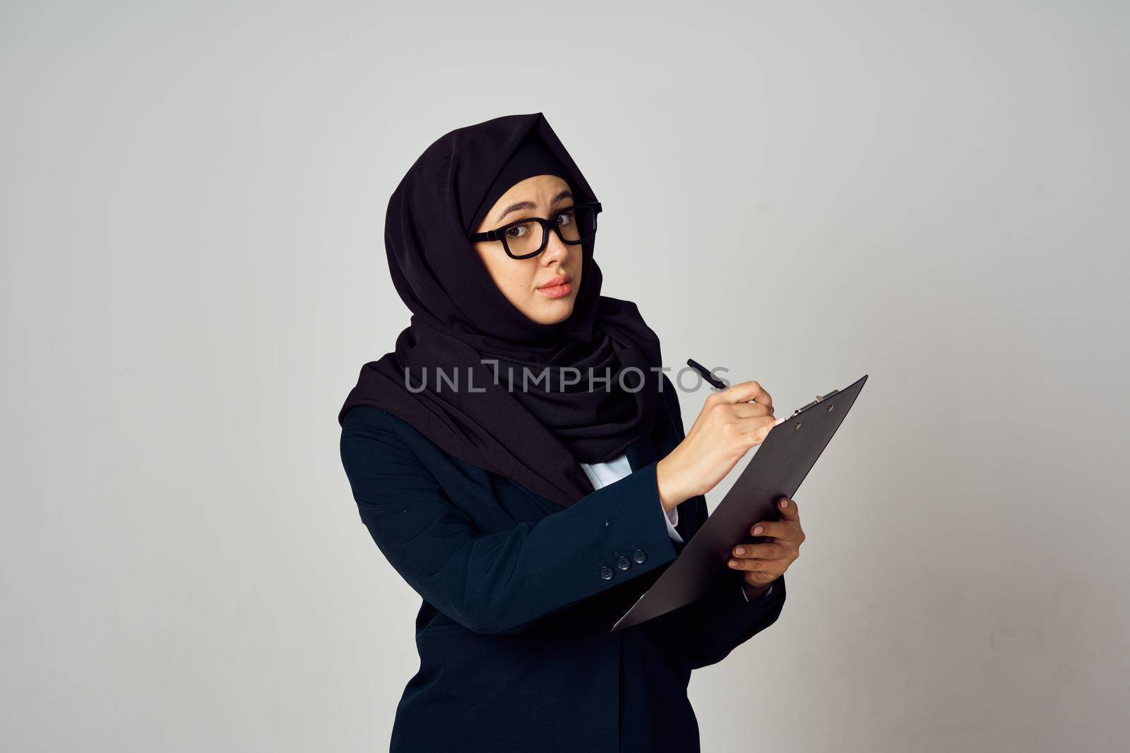 woman in black hijab laptop work technology office by Vichizh