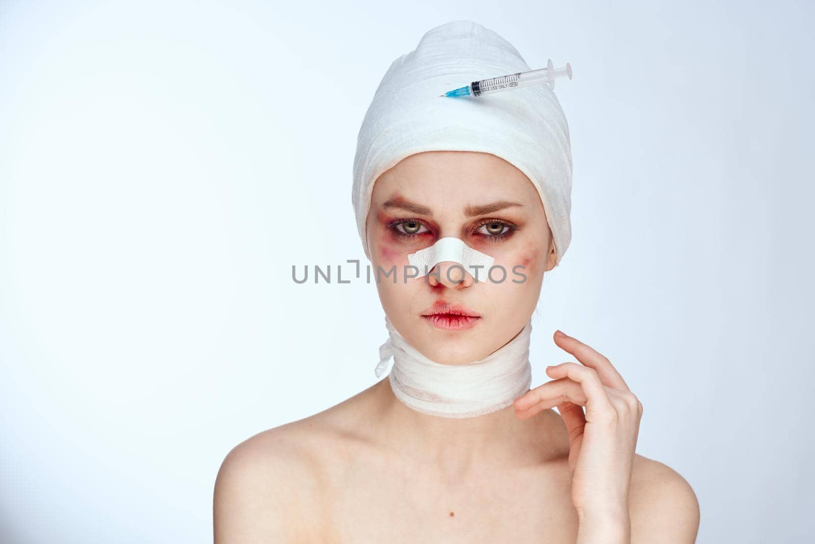 portrait of a woman plastic surgery operation bare shoulders light background by Vichizh