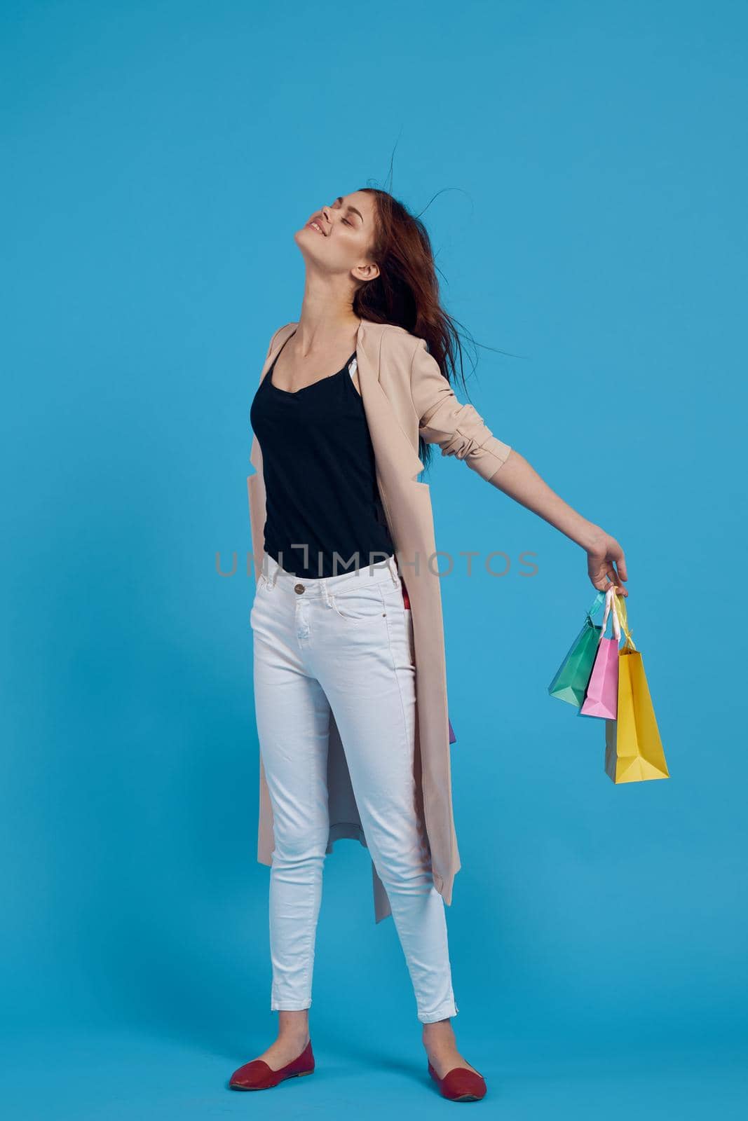 beautiful woman with packages in hands Shopaholic isolated background. High quality photo