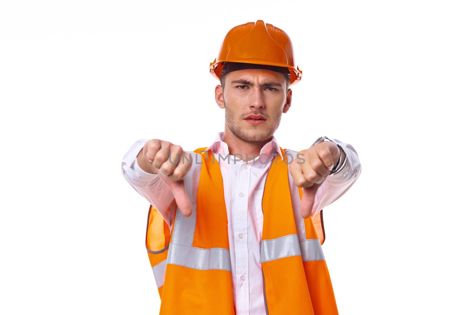 man in working orange uniform construction work. High quality photo