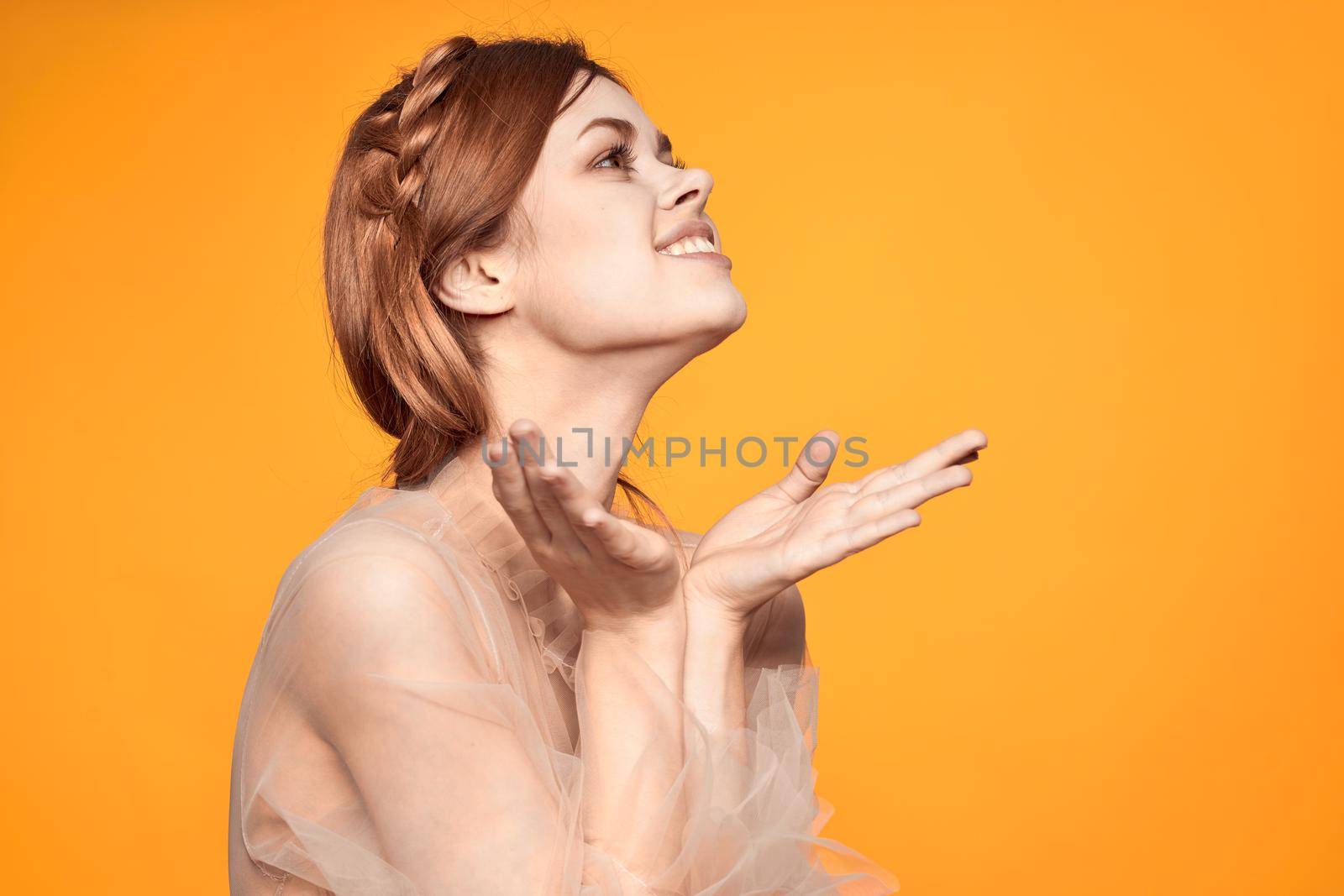 cheerful woman attractive look lifestyle romance yellow background. High quality photo