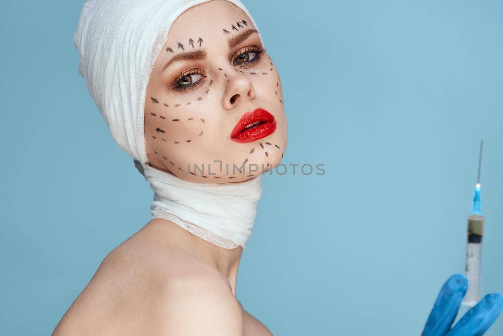 beautiful woman Red lips plastic surgery operation bare shoulders close-up. High quality photo