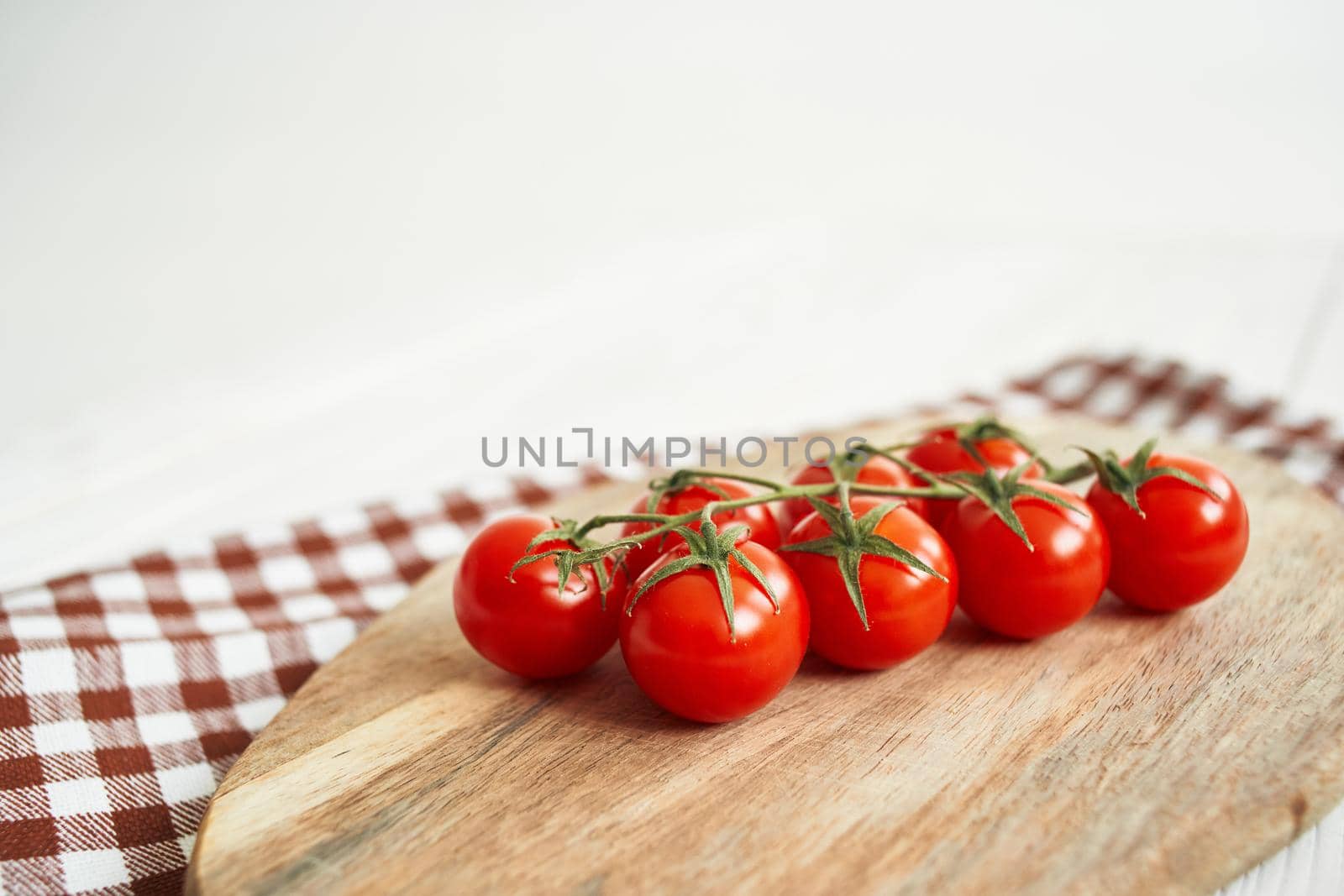 vegetables kitchen cooking salad red tomatoes wood background. High quality photo