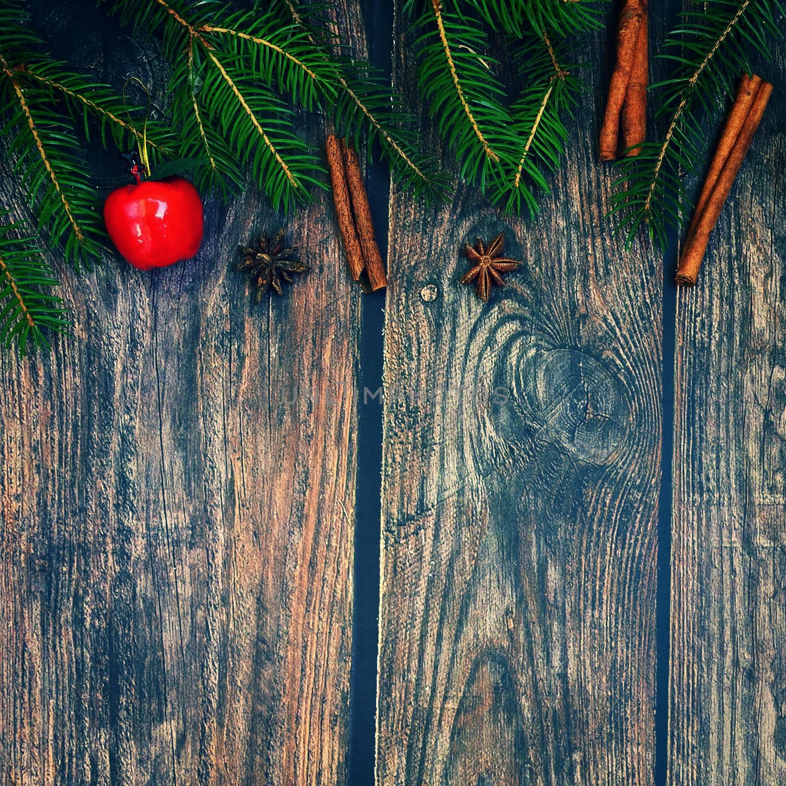 Christmas background with decorations on a brown wooden background. Flat lay, top view with copy space. by Montypeter