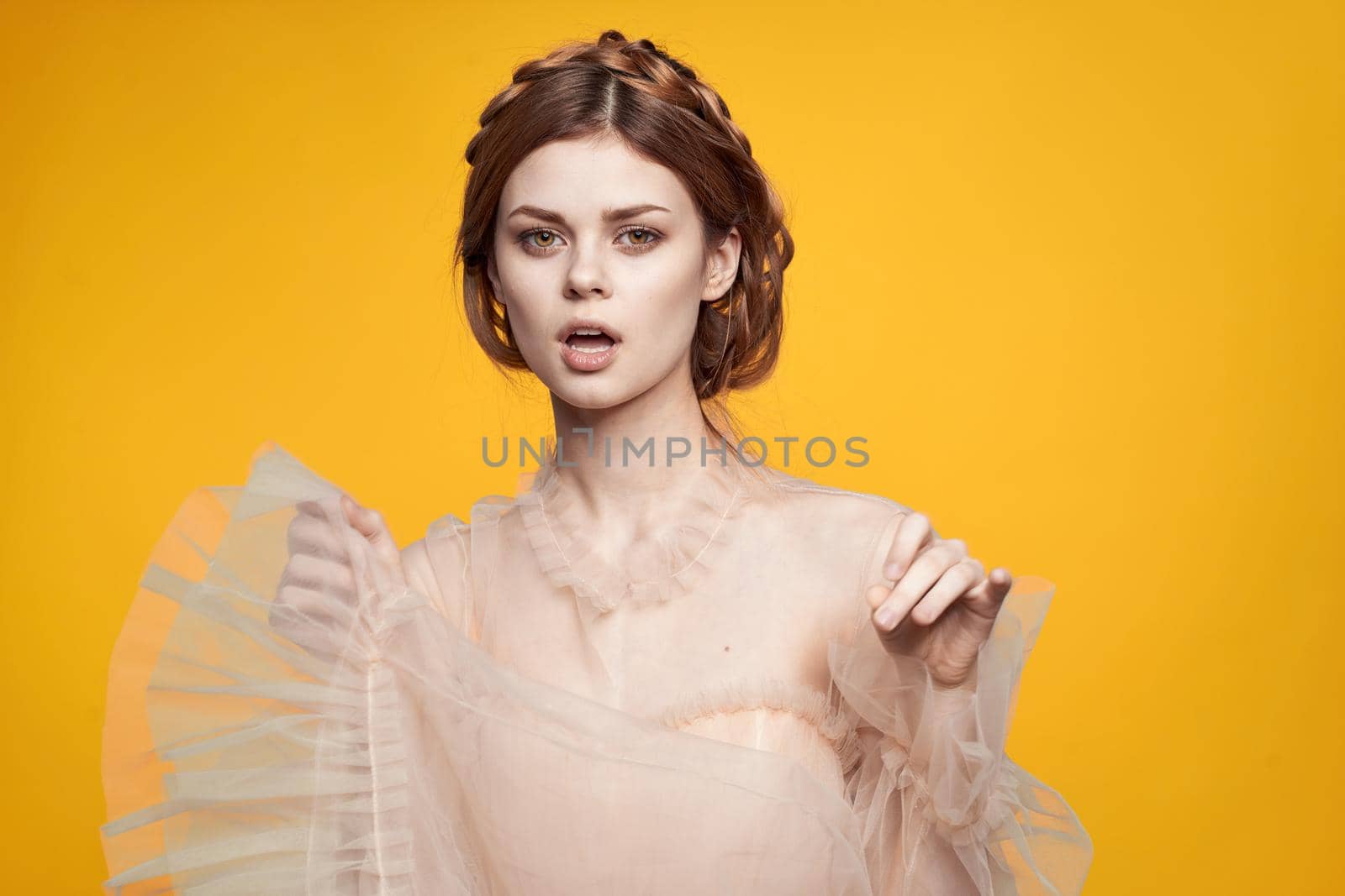 beautiful woman gesture hands cosmetics fashion hairstyle posing isolated background. High quality photo