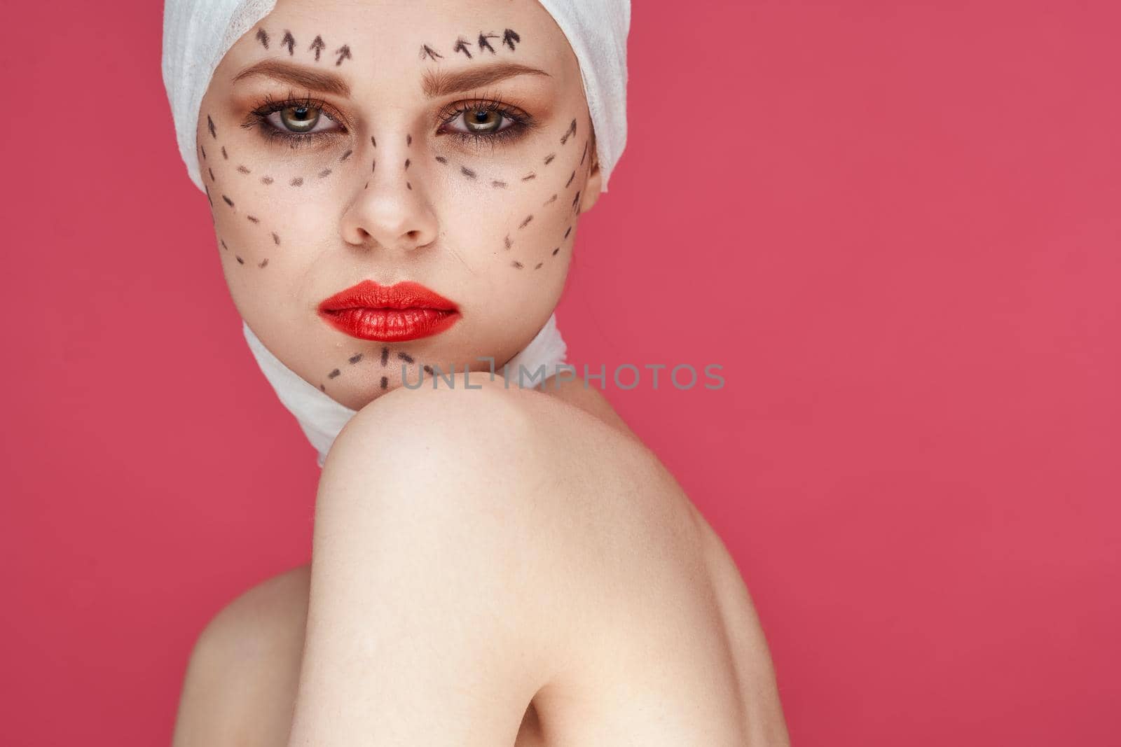 portrait of a woman Red lips plastic surgery operation bare shoulders close-up. High quality photo