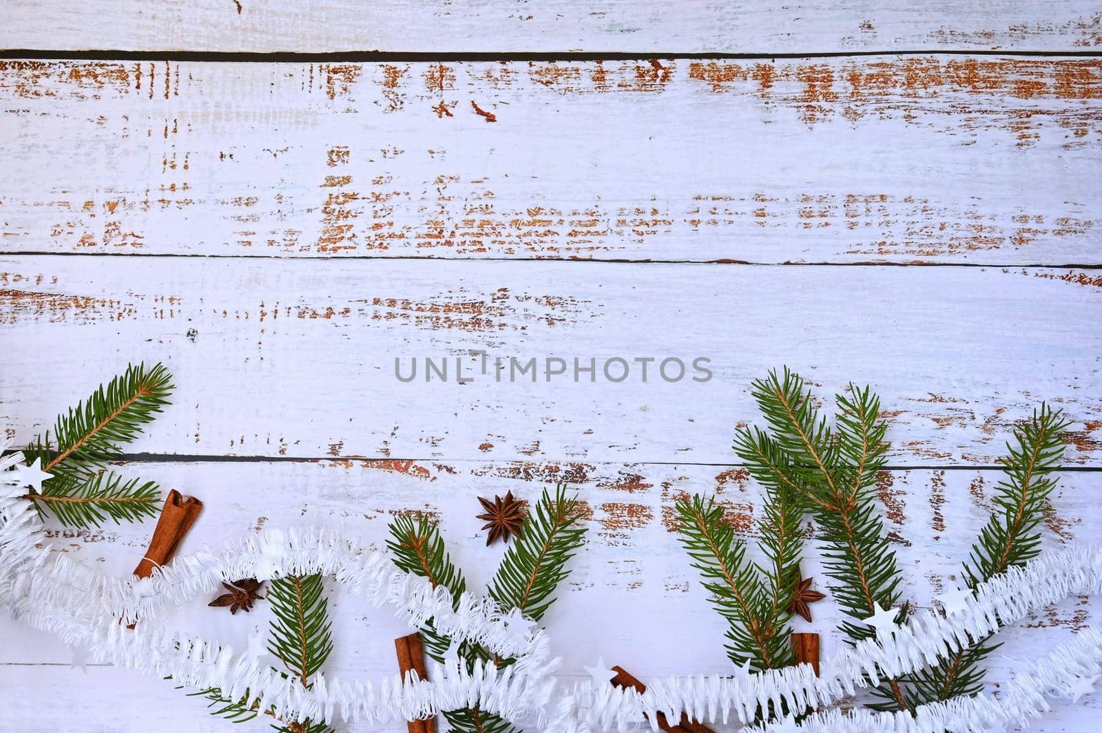 Christmas composition. Beautiful holiday decorations on a white wooden background. Flat lay, top view with copy space.