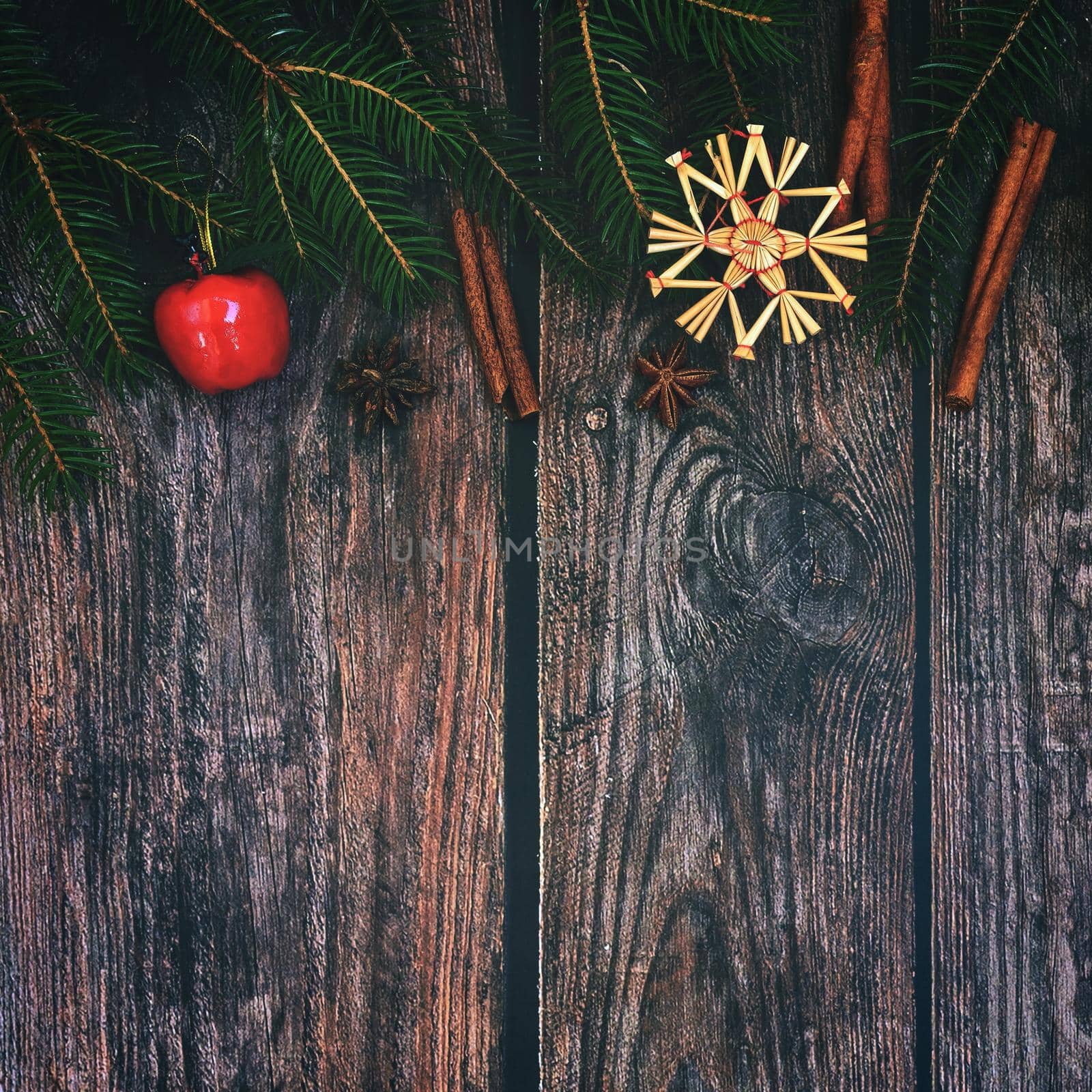 Christmas background with decorations on a brown wooden background. Flat lay, top view with copy space. by Montypeter