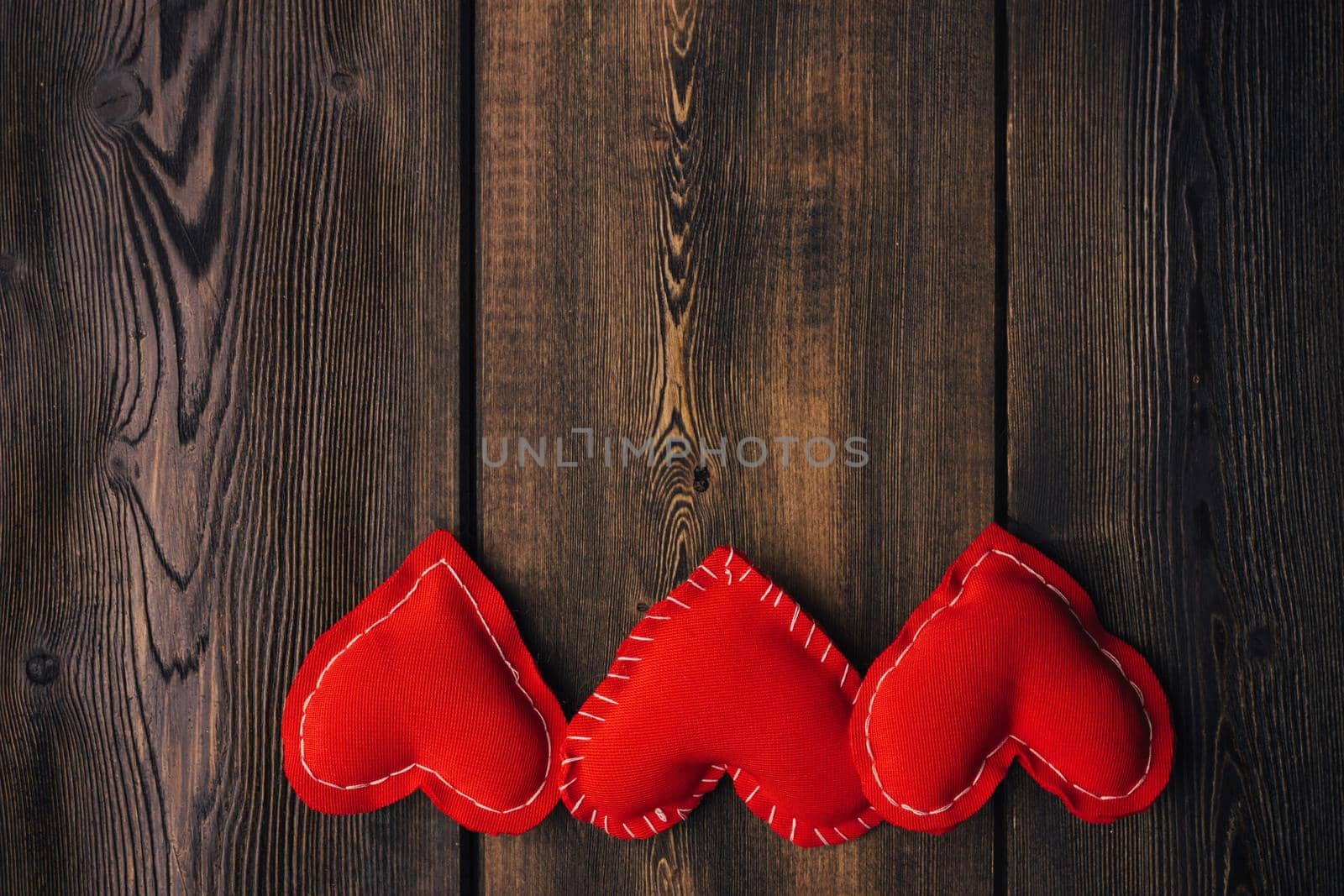 Valentine's day hearts on wooden background decoration object by Vichizh