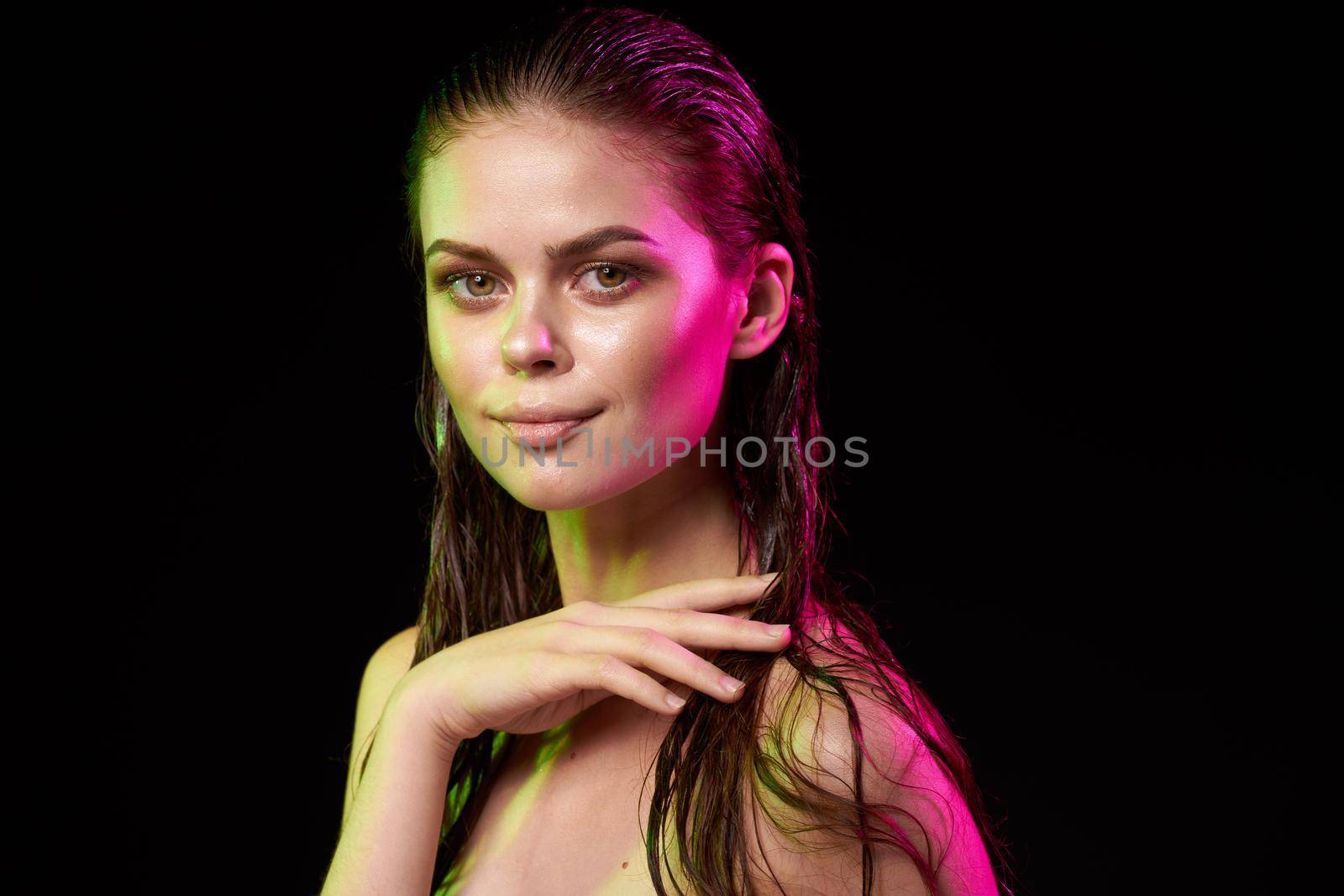 woman model bare shoulders clean skin wet hair close-up. High quality photo