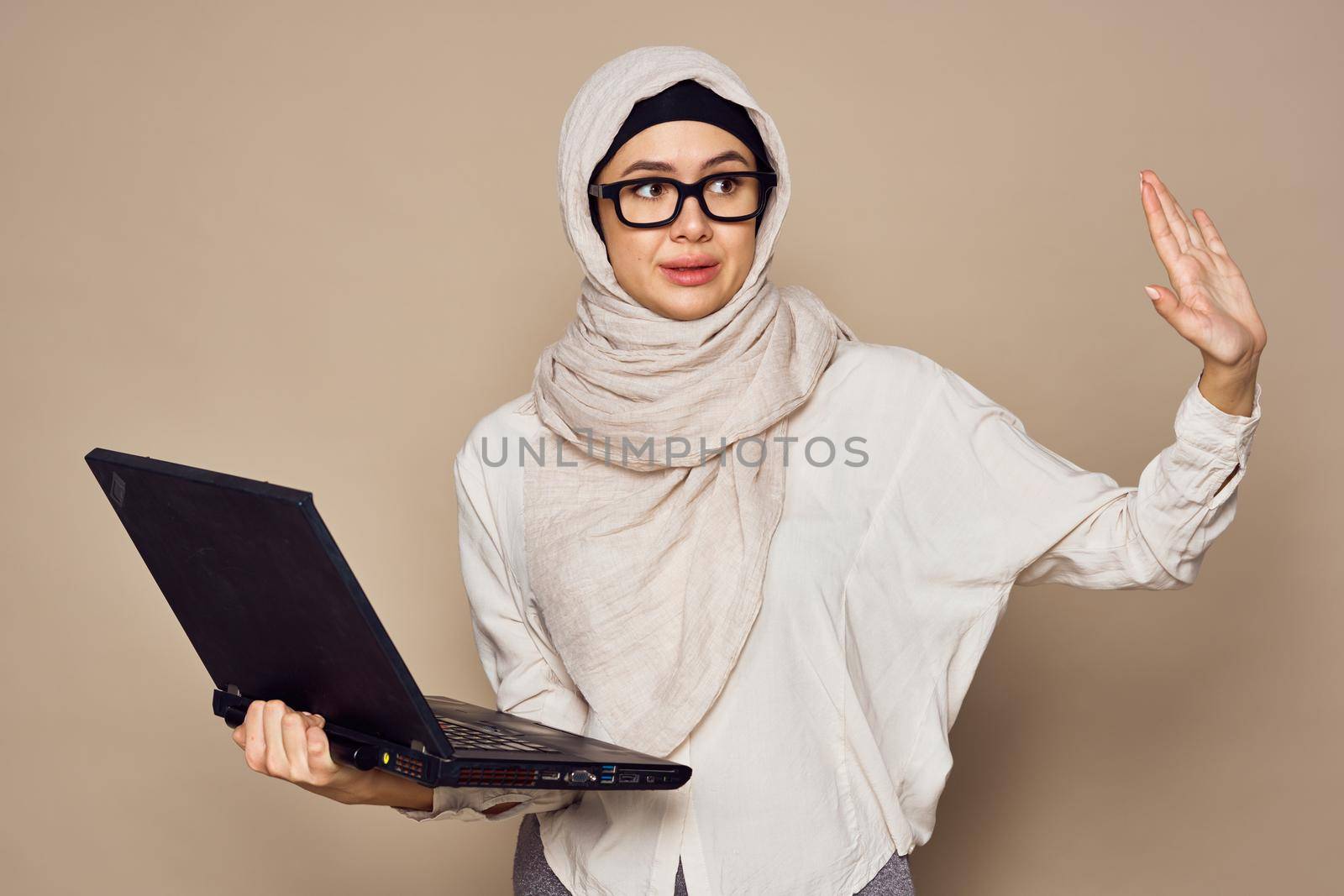 muslim woman with laptop work learning technology by Vichizh