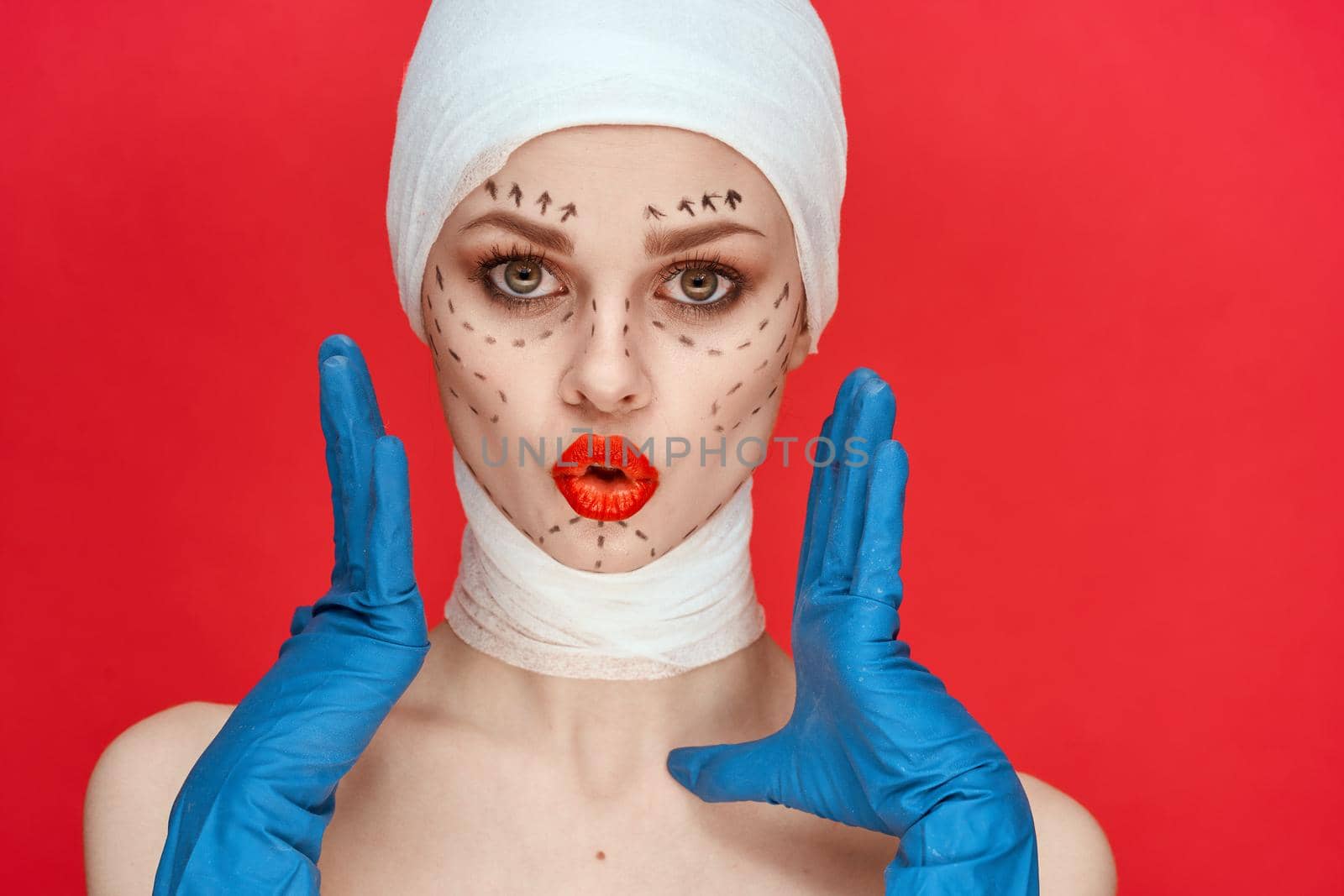 a person Red lips plastic surgery operation bare shoulders red background. High quality photo
