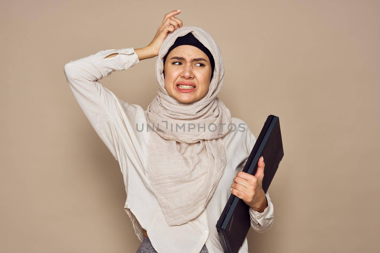 muslim woman with laptop work learning technology. High quality photo