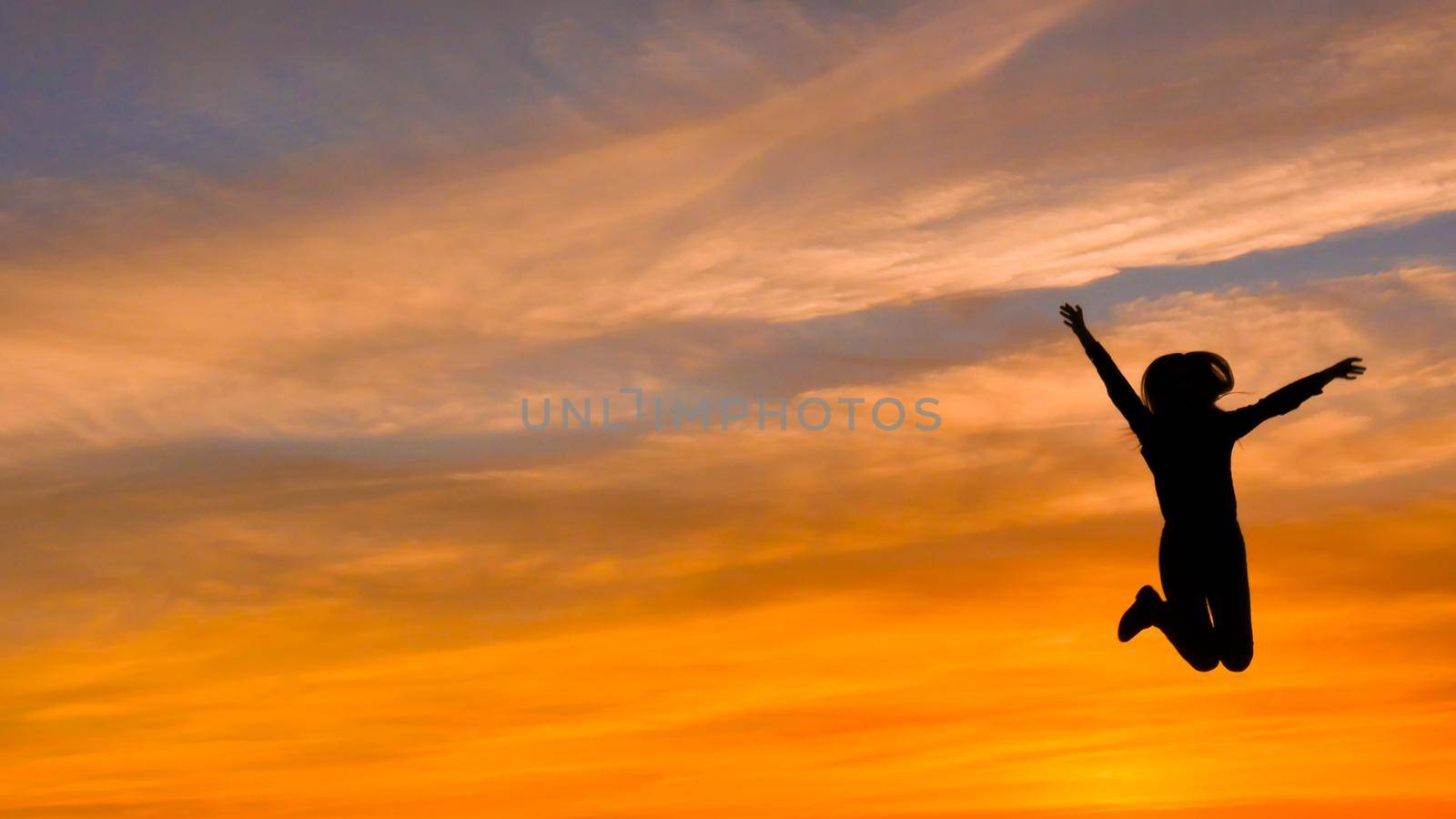 Jumping Woman At Sunset, Silhouettes, Freedom And Happiness