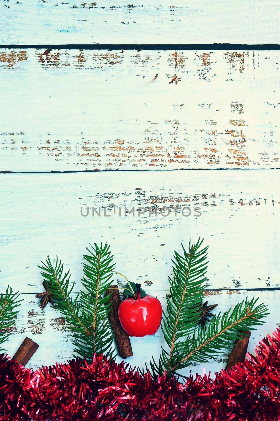 Christmas background. Beautiful decorations for the Christmas tree on a wooden white background. Concept for holidays and winter time with copy space.