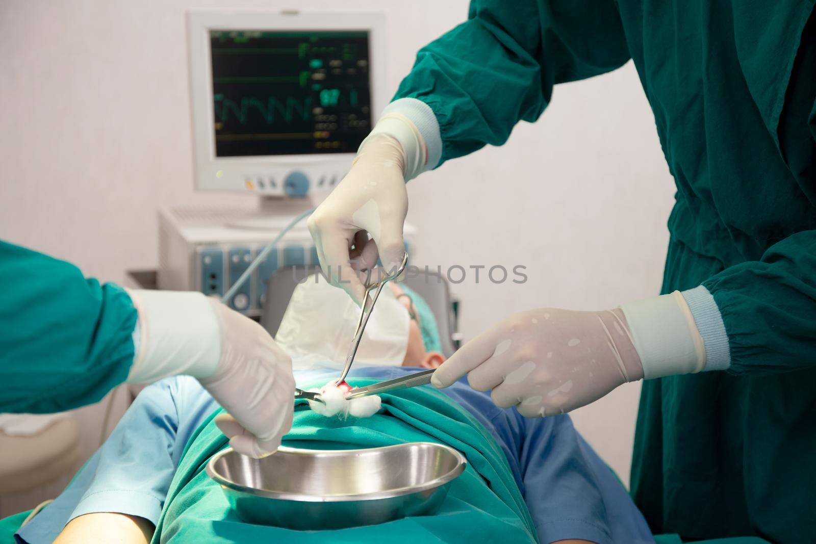 Closeup hands of team doctor and surgeon doing surgery with patient in the operation at hospital, medical and emergency, specialist and assistant rescue patient with expertise, surgical and health. by nnudoo