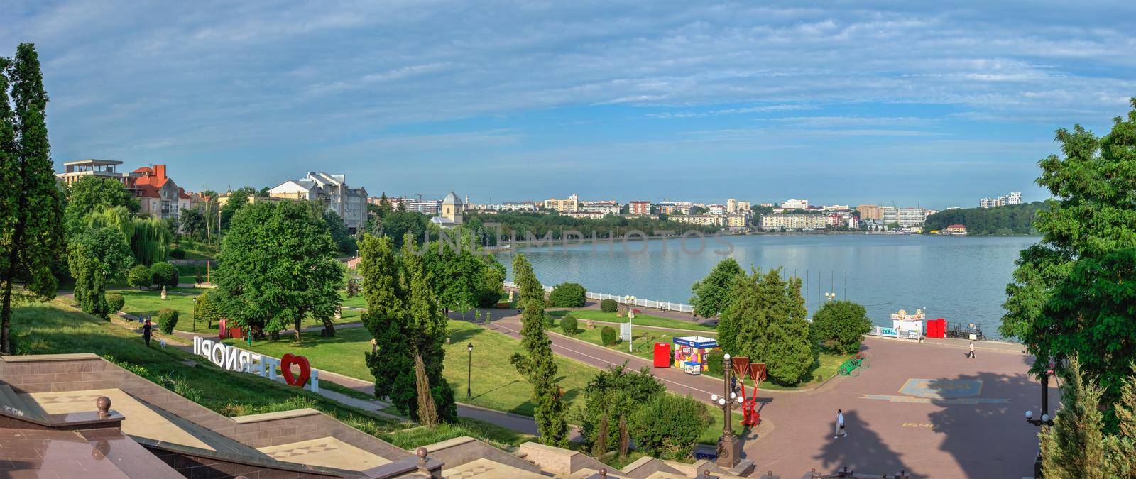 Ternopil, Ukraine 06.07.2021. The embankment of Ternopil pond in Ukraine on a summer morning