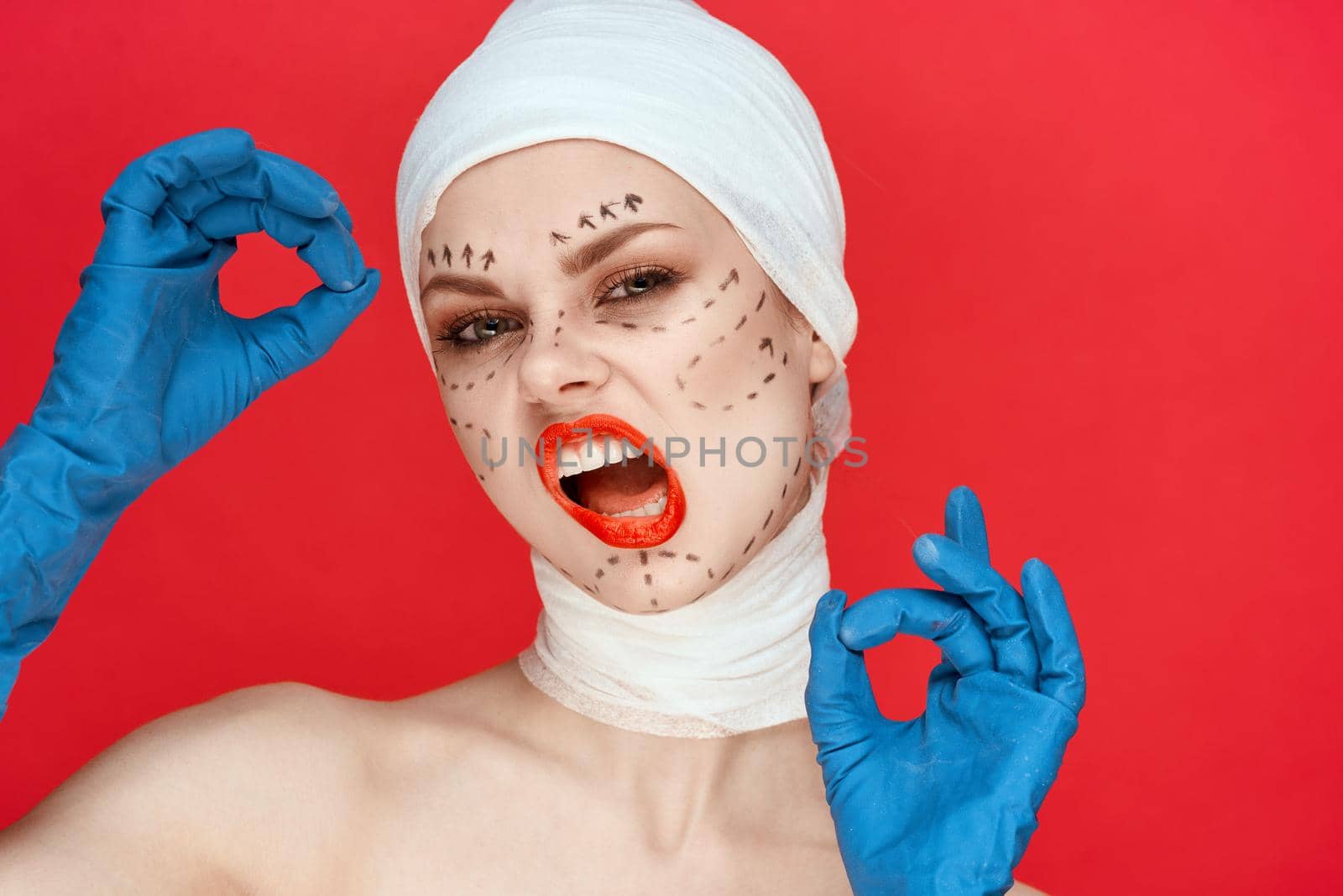 female patient in blue gloves syringe in hands contour on the face lifting studio lifestyle by Vichizh