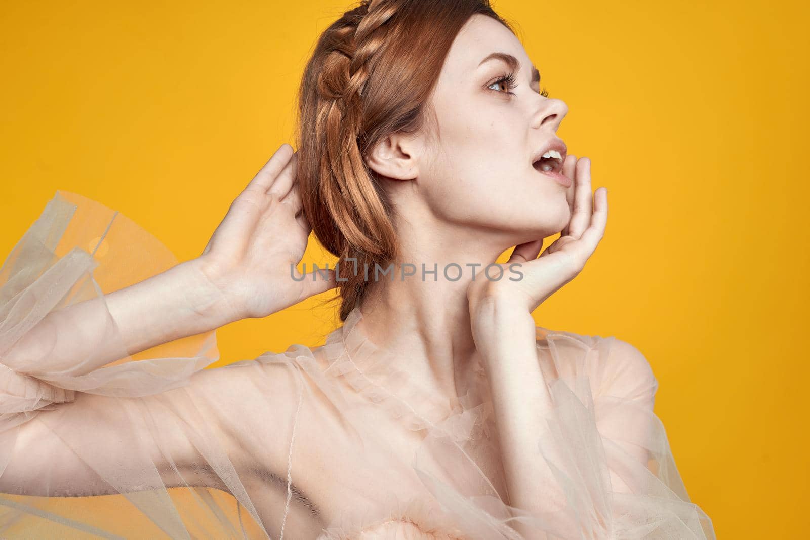 beautiful woman gesture hands cosmetics fashion hairstyle posing isolated background. High quality photo