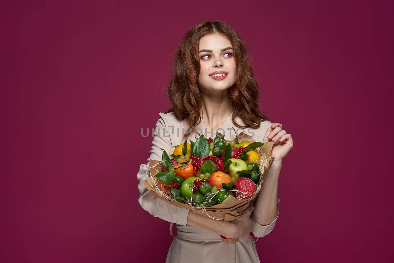 beautiful woman fun posing fruit bouquet vitamins isolated background. High quality photo